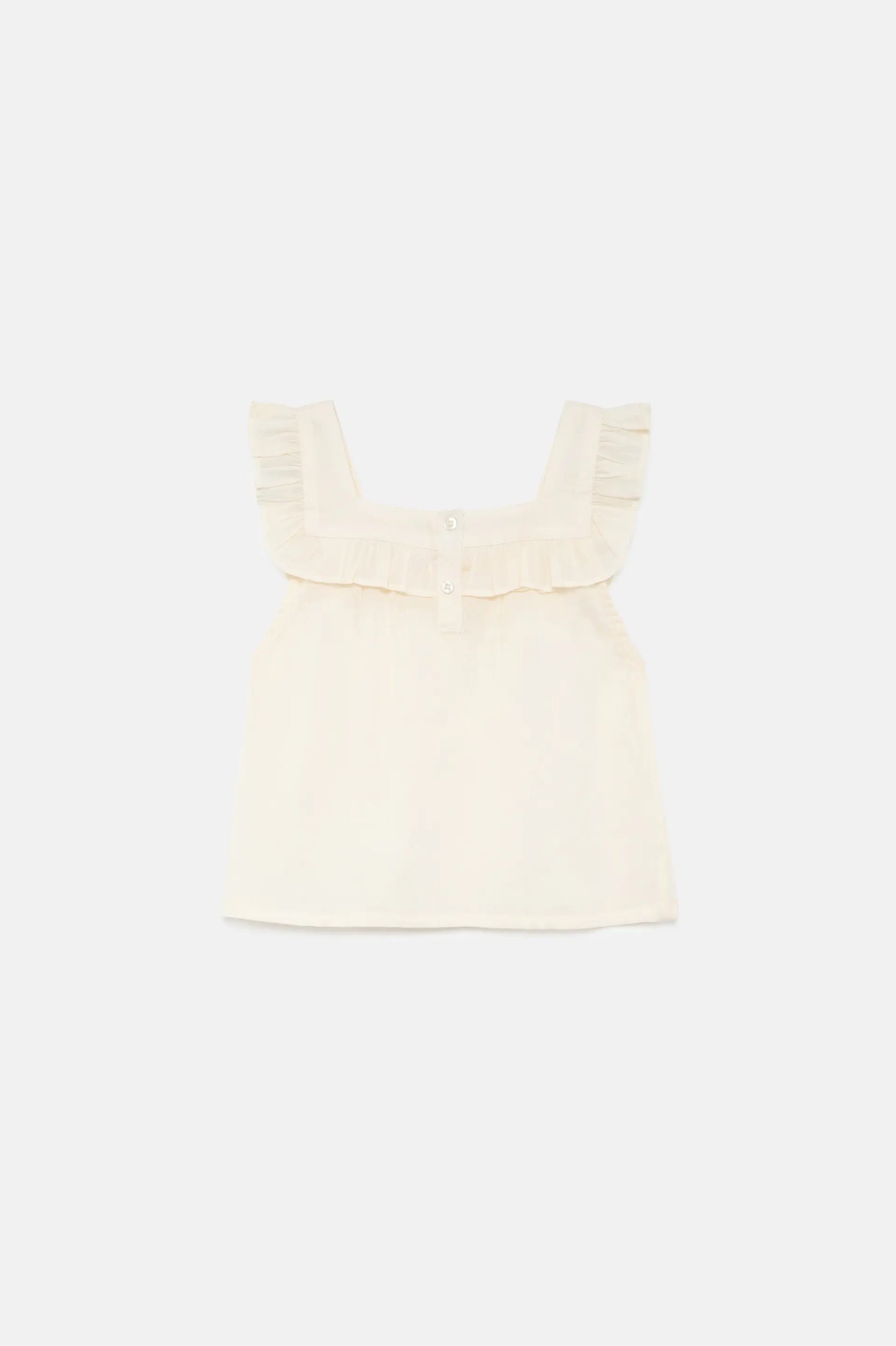 Girl's white ruffle top