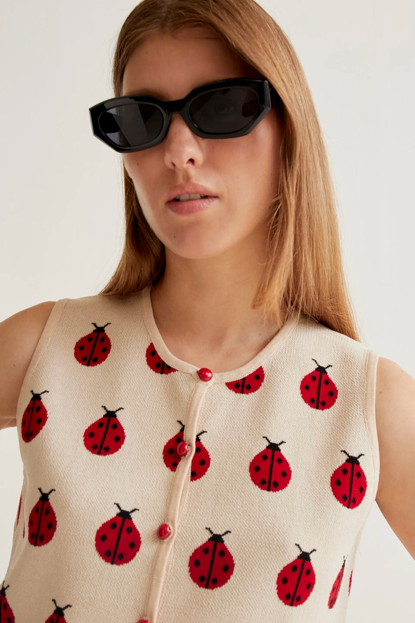 Top in maglia con stampa Coccinella rossa