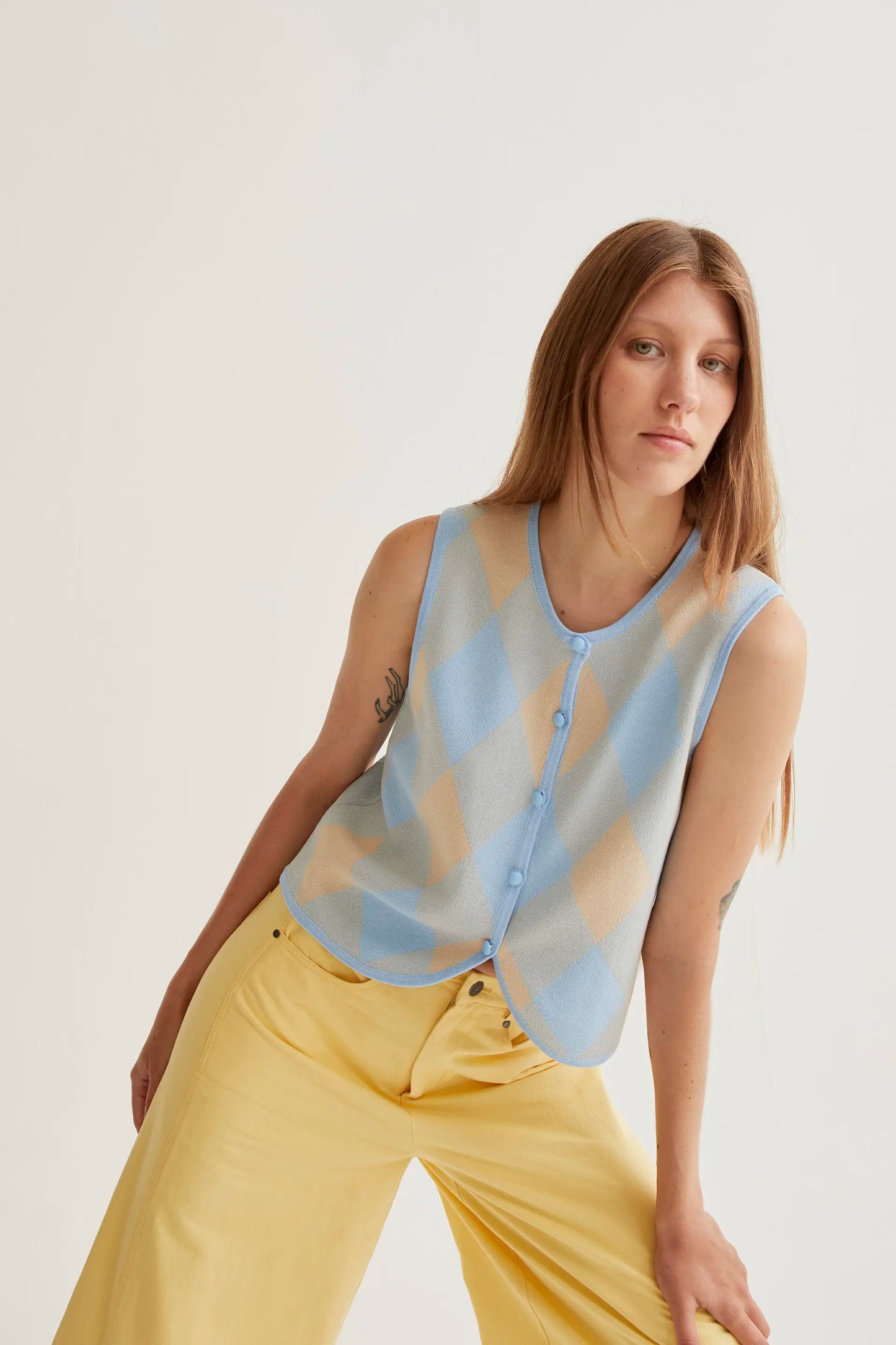 Blue diamond-patterned knit top