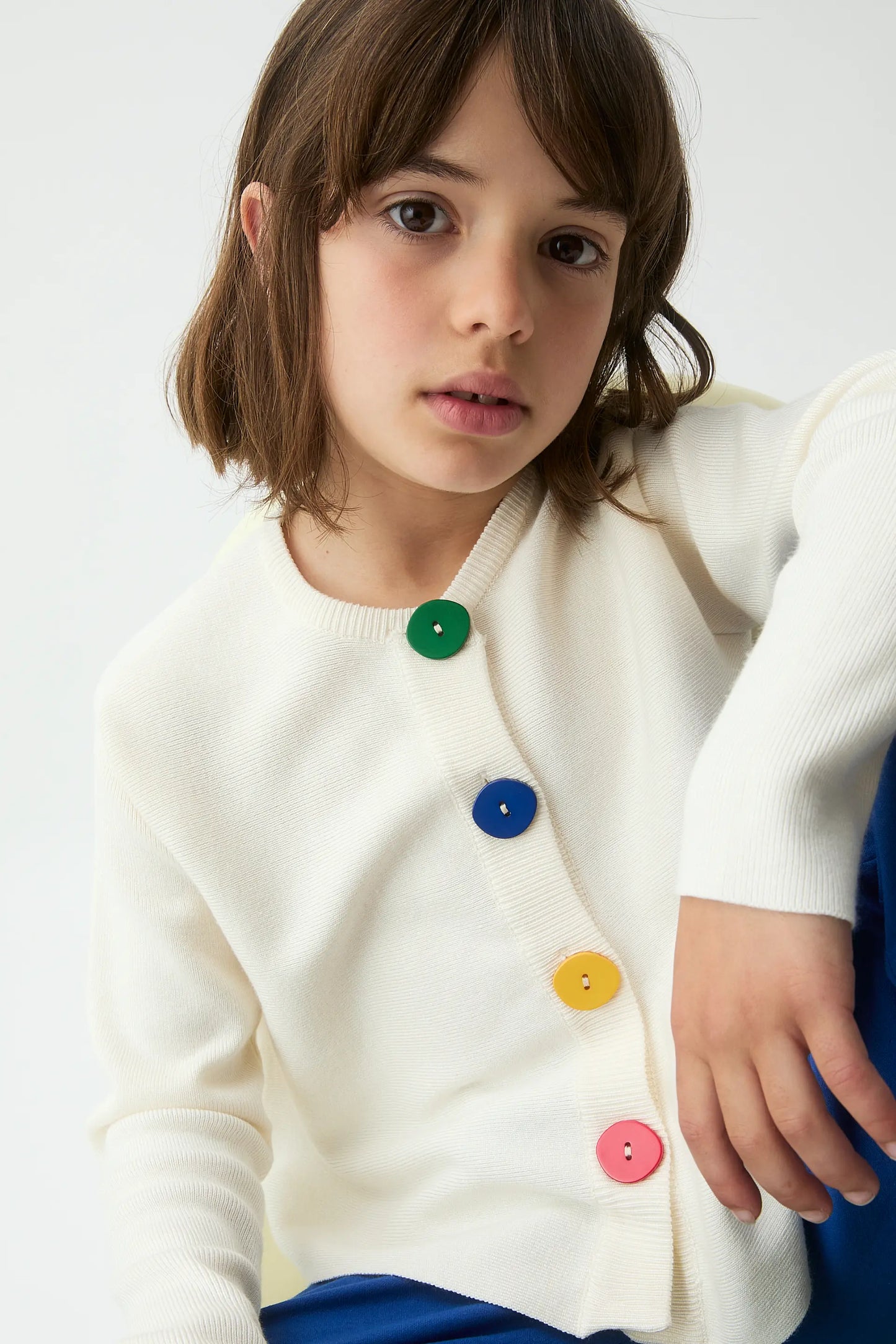 Cardigan bianco in maglia per bambine