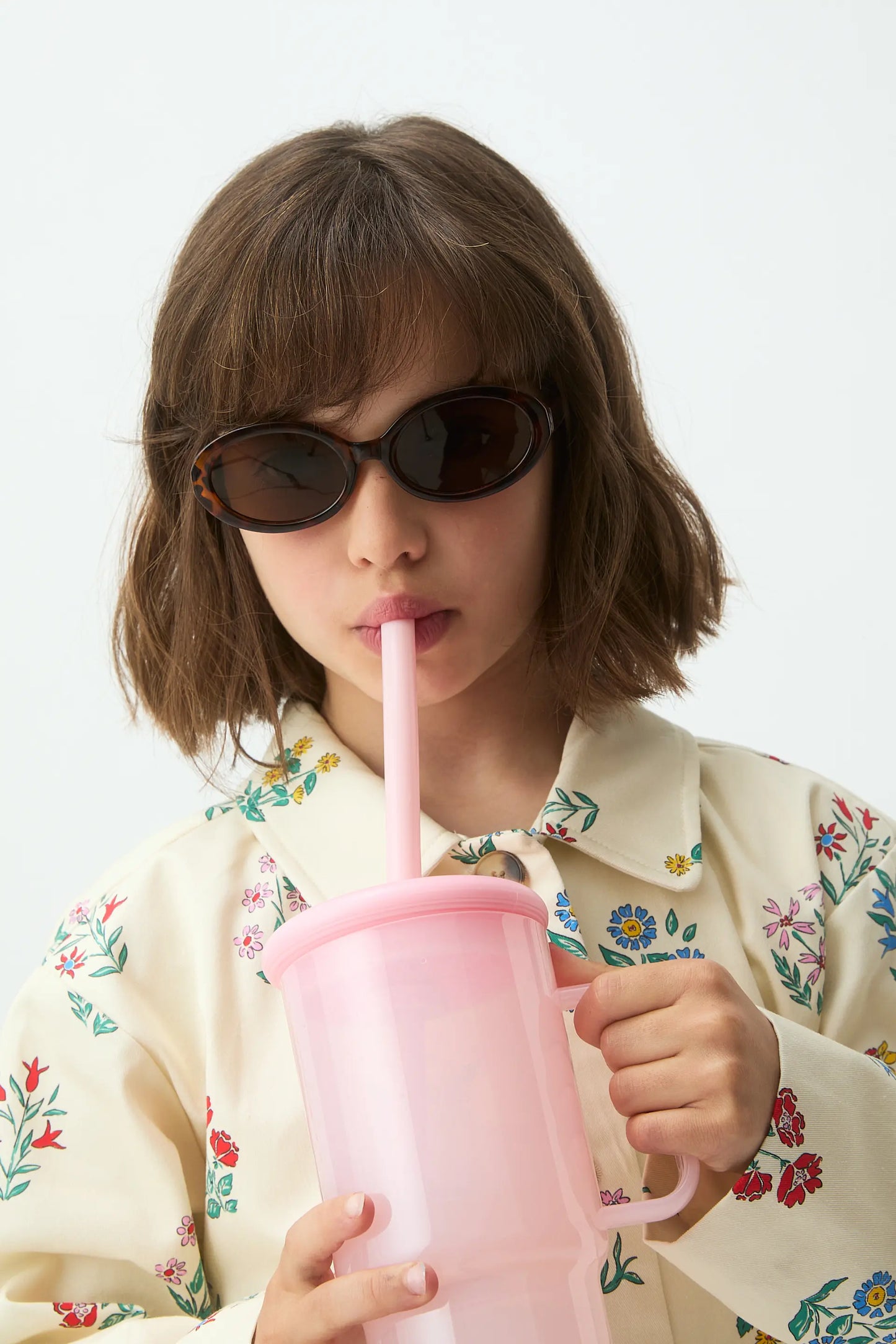 Girl's trench coat with Gardener print