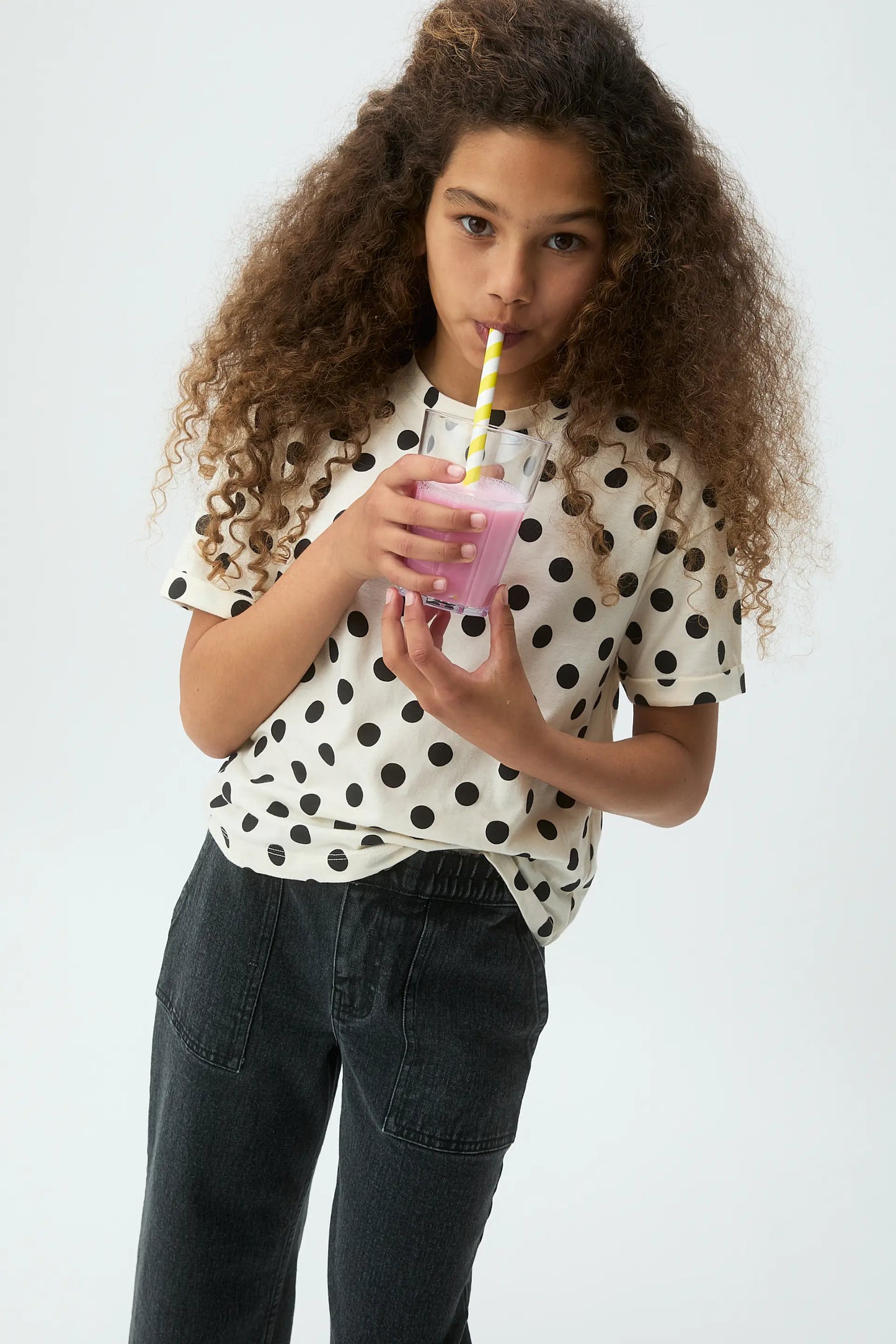 Girl's T-shirt with black polka dot print