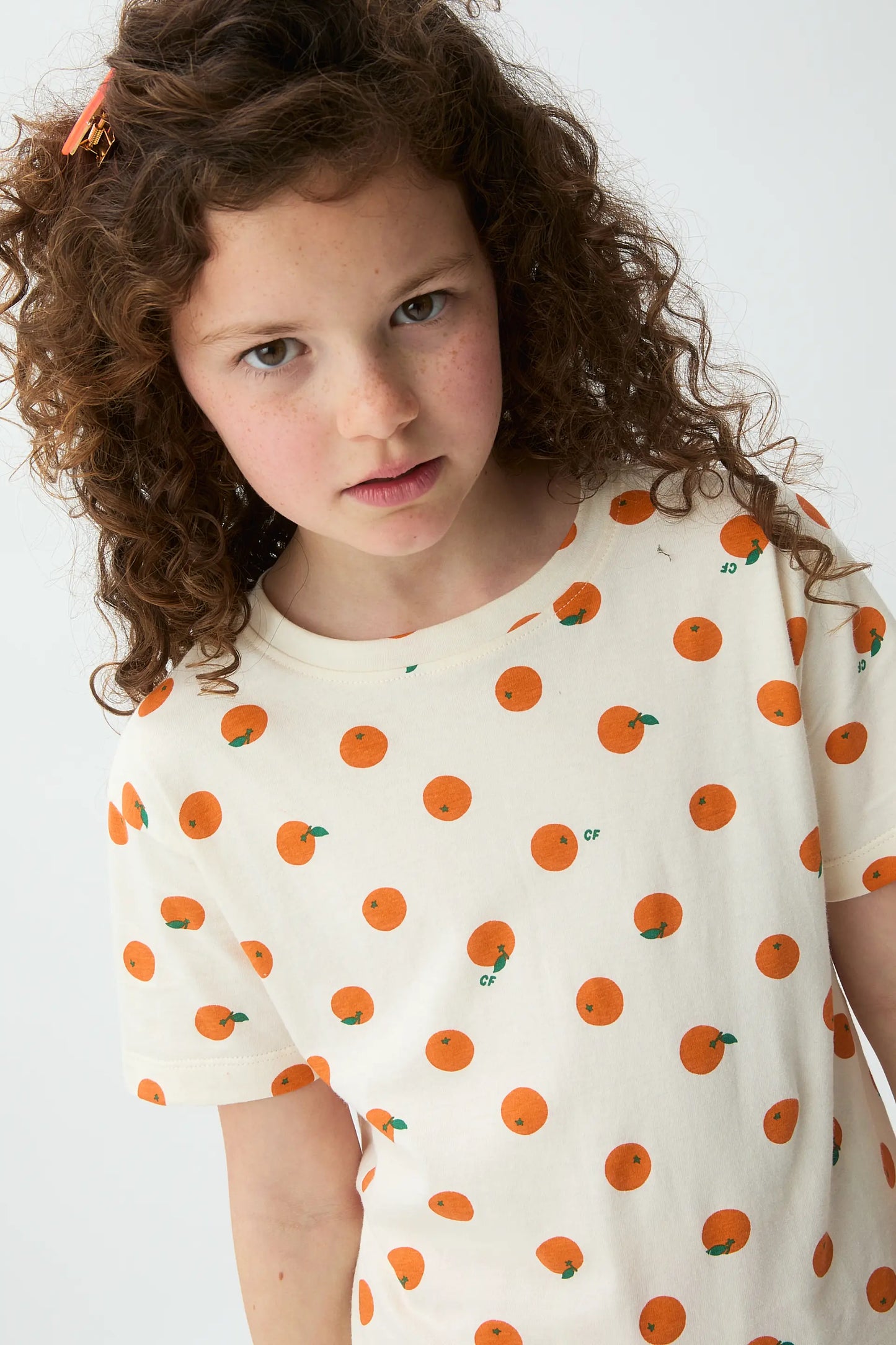 Girl's T-shirt with orange print
