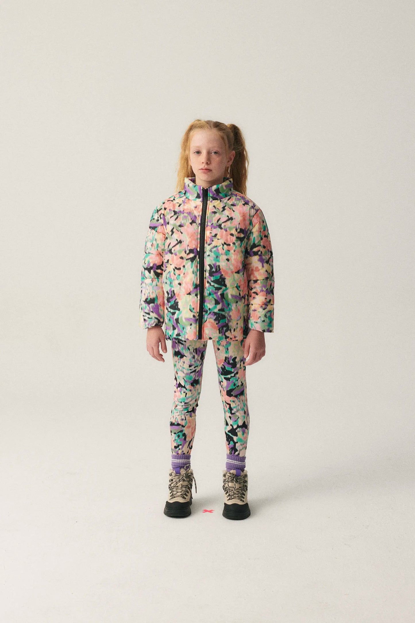 Unisex short puffer coat with fantasy print