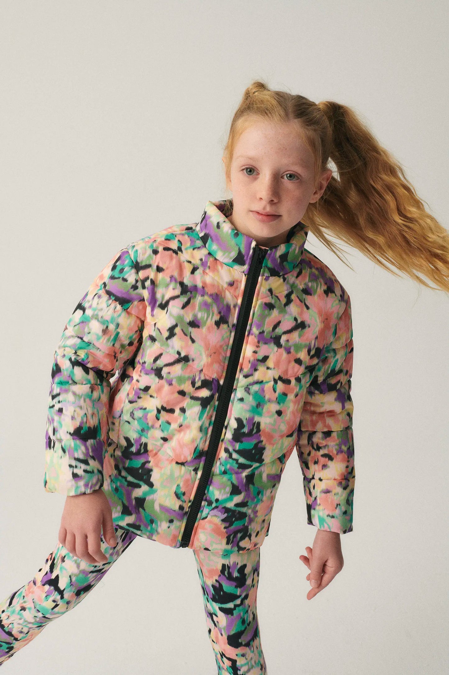 Unisex short puffer coat with fantasy print