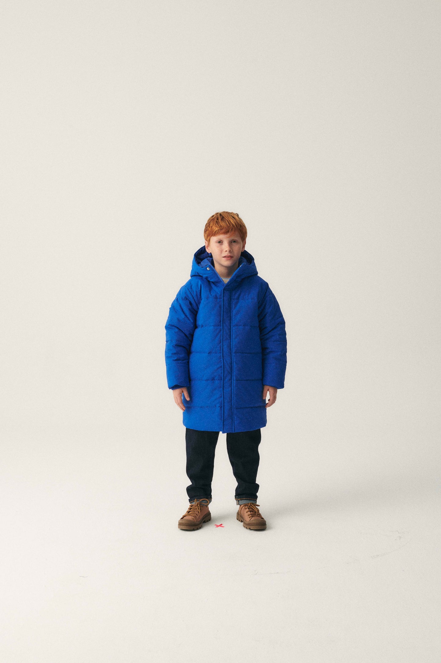 Abrigo unisex plumífero midi con capucha azul