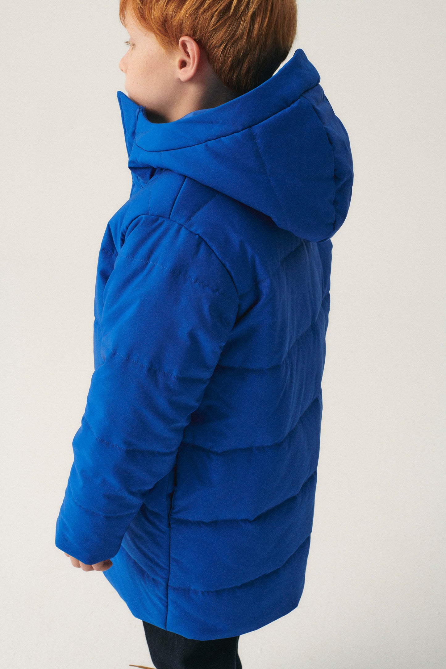 Abrigo unisex plumífero midi con capucha azul