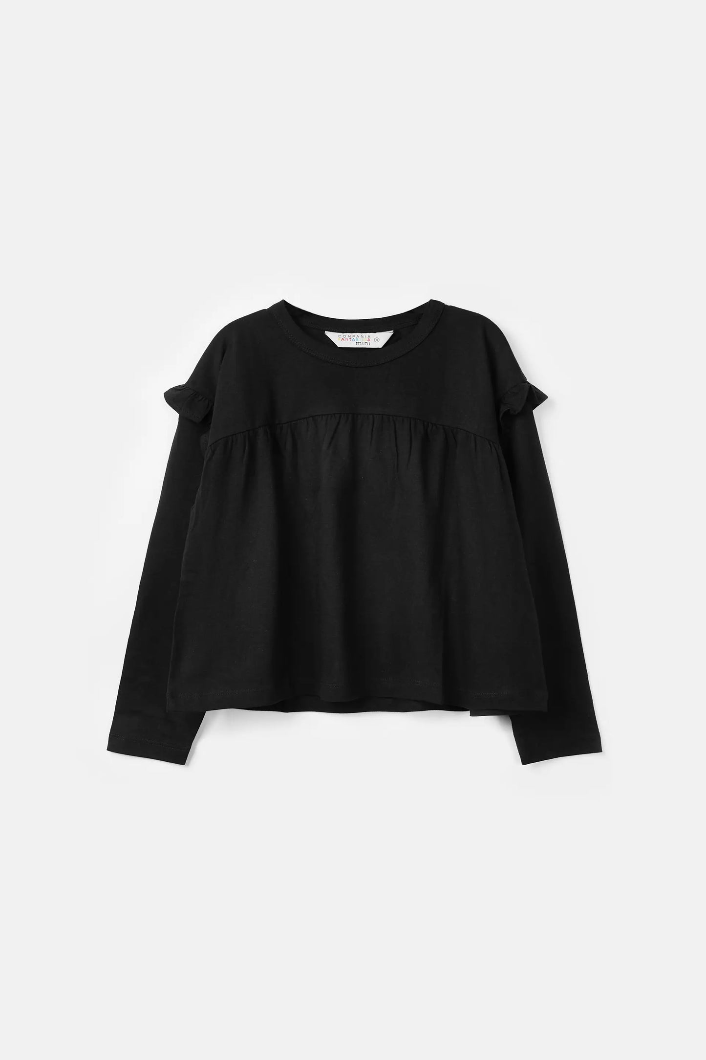 Girl's top with black ruffles