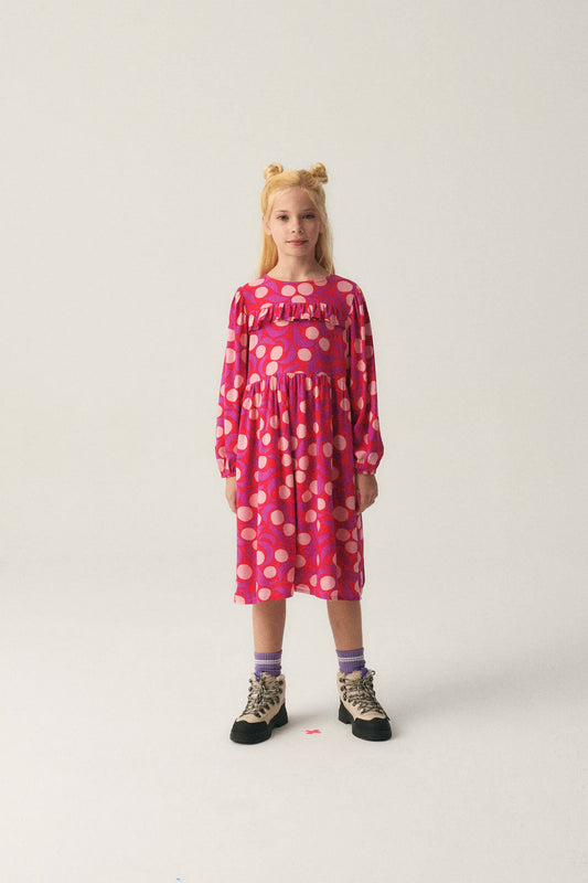 Vestido midi de niña con volante y estampado fantasía rosa