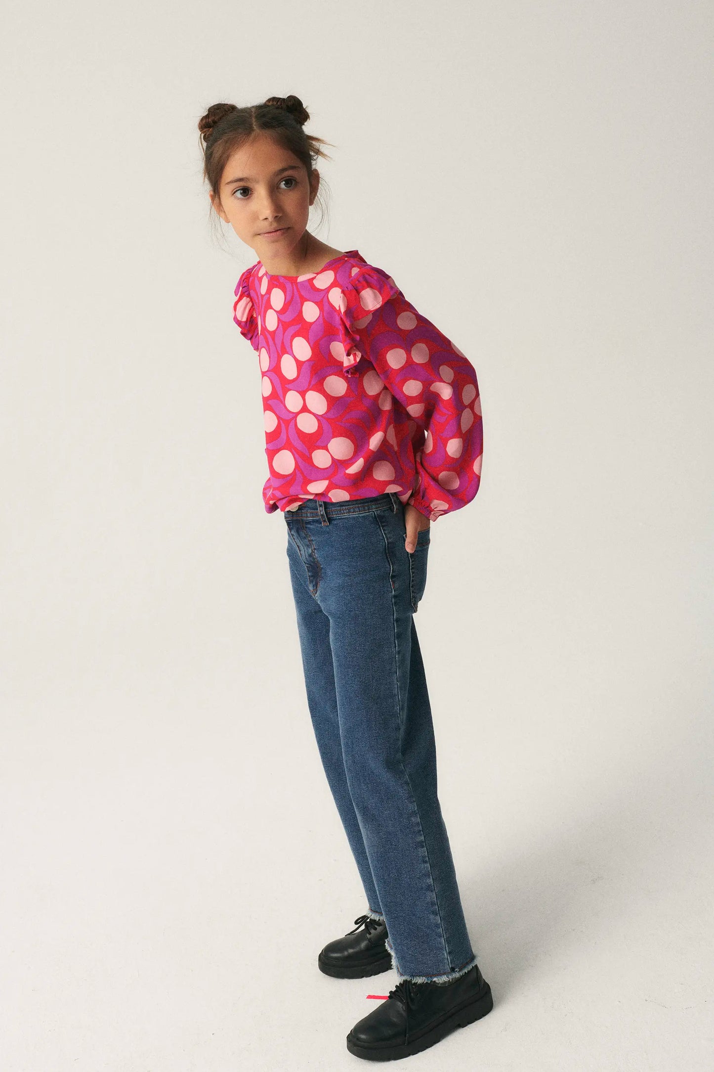 Girl's top with ruffles and pink fantasy print