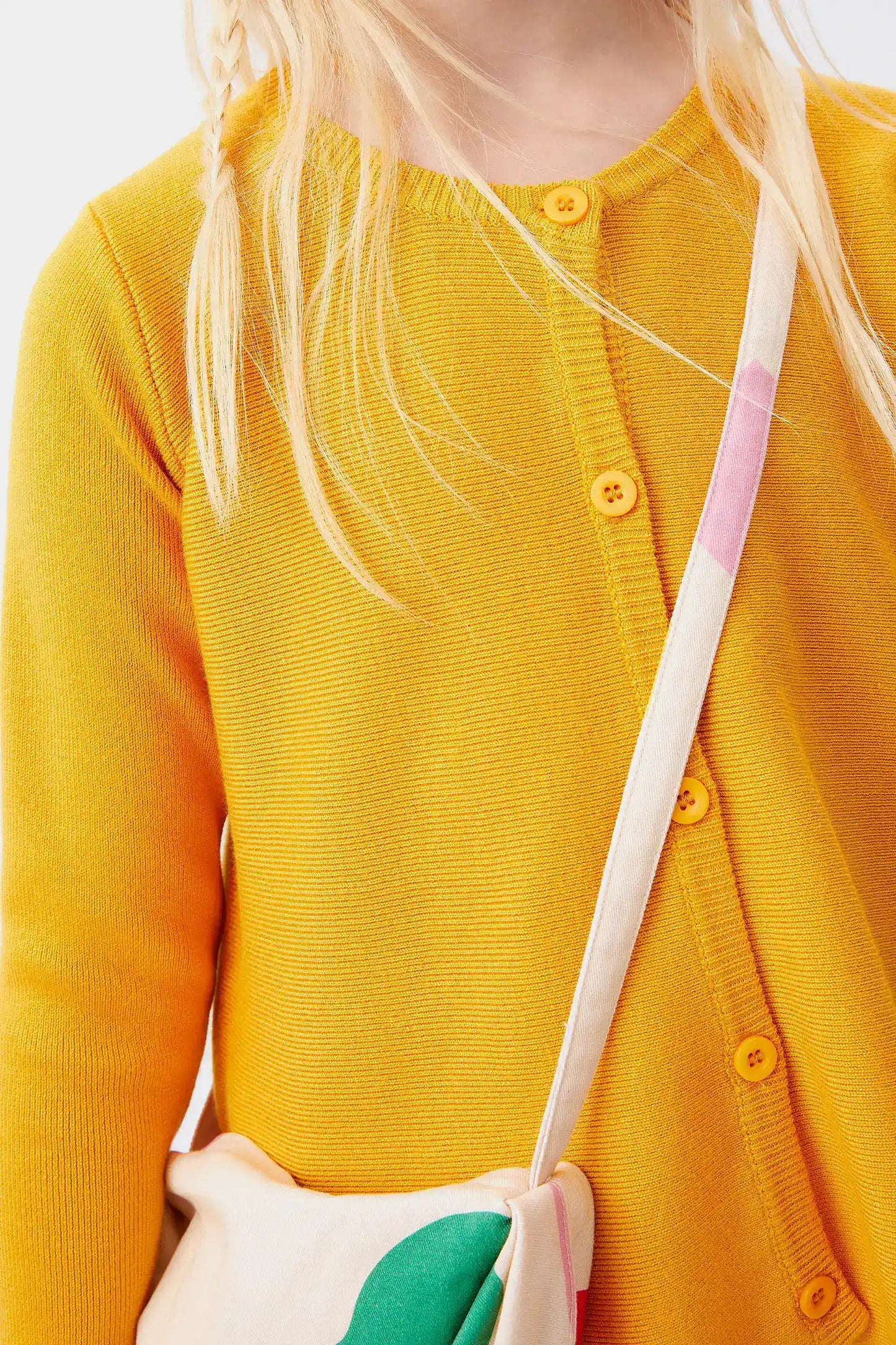 Cárdigan de niña evasé amarillo