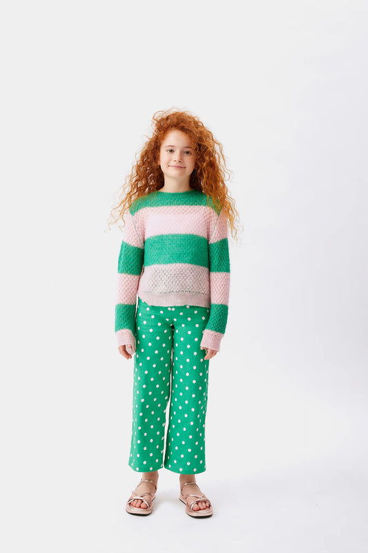 Maglione da bambina lavorato a trecce a righe rosa