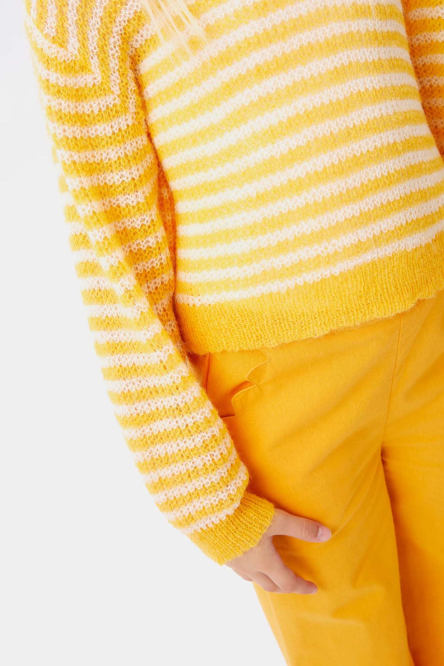 Girl's yellow striped cable knit sweater