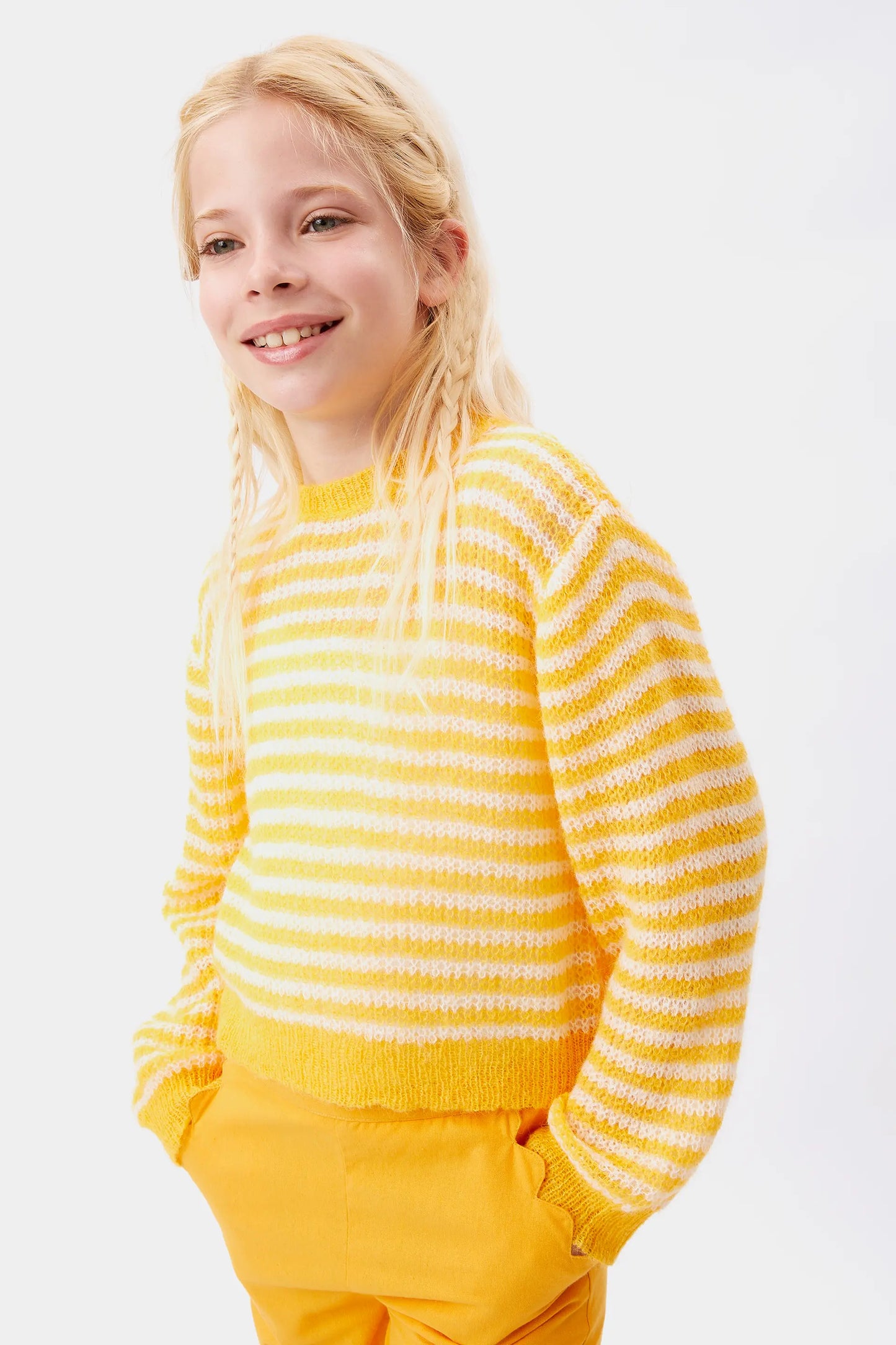 Girl's yellow striped cable knit sweater