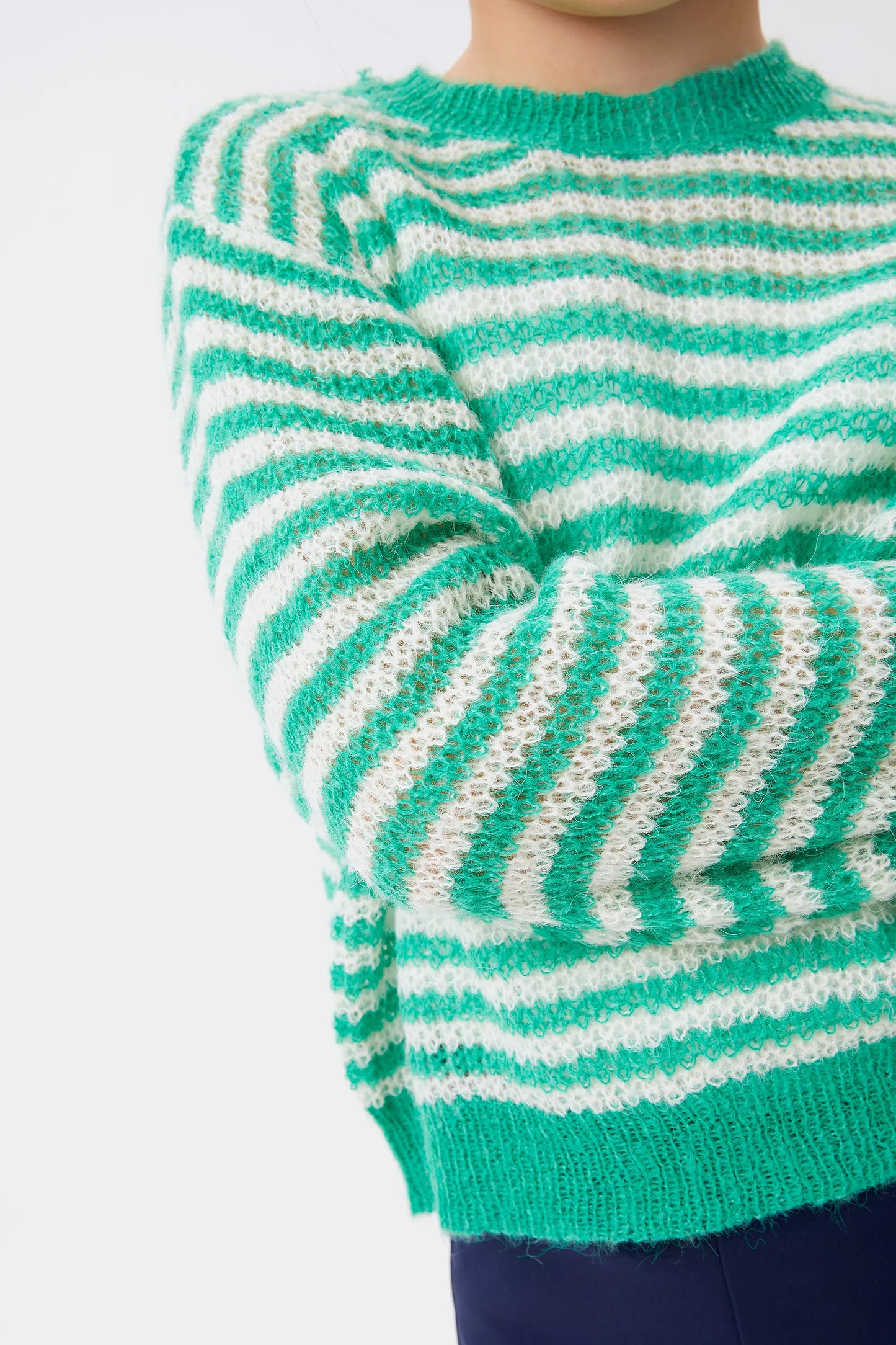 Girl's green striped cable knit sweater