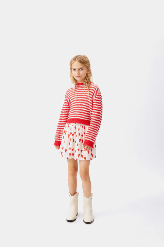 Maglione da bambina lavorato a trecce a righe rosse
