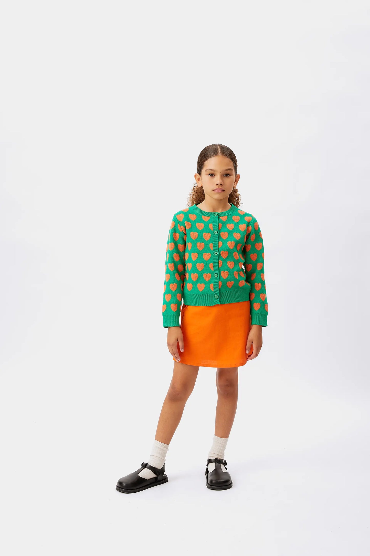 Cardigan da bambina con cuori verdi