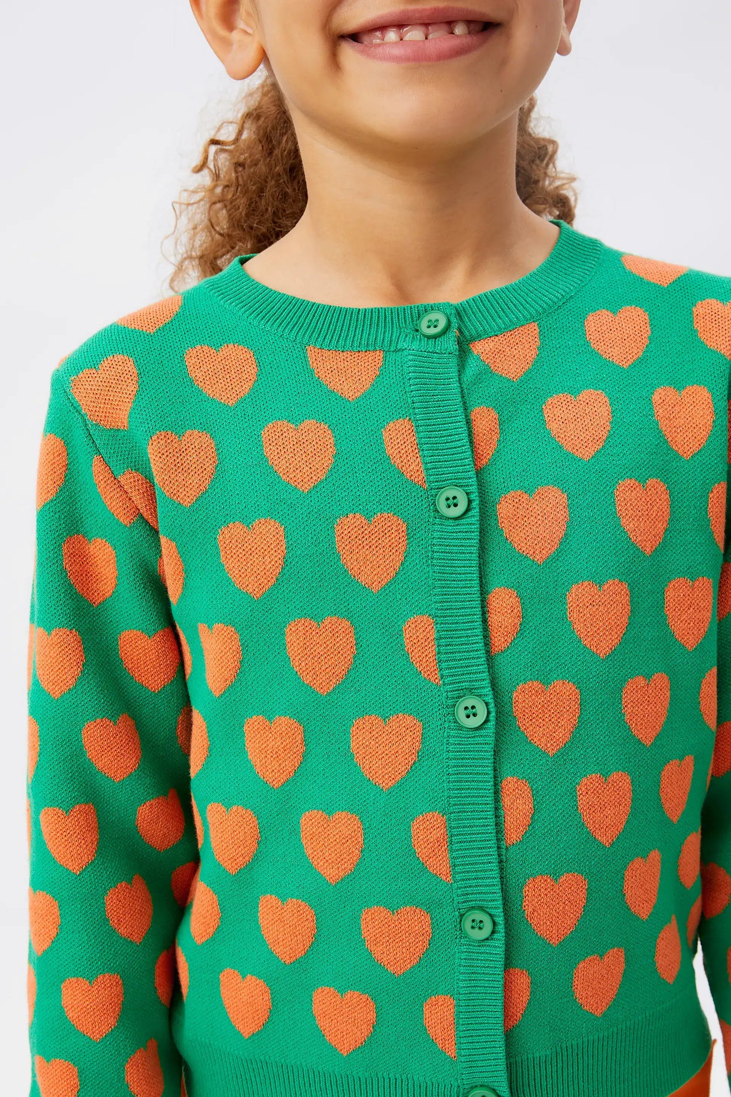 Cardigan da bambina con cuori verdi