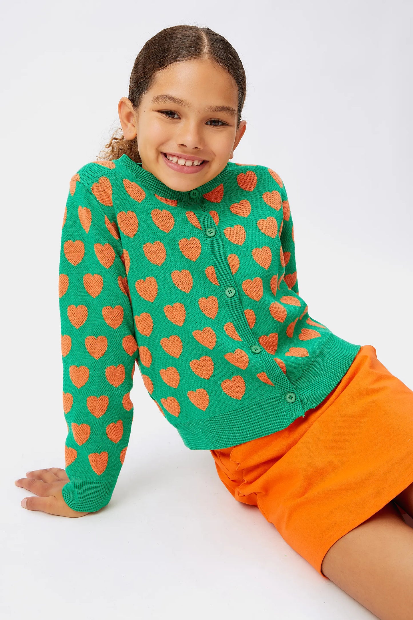 Cardigan da bambina con cuori verdi