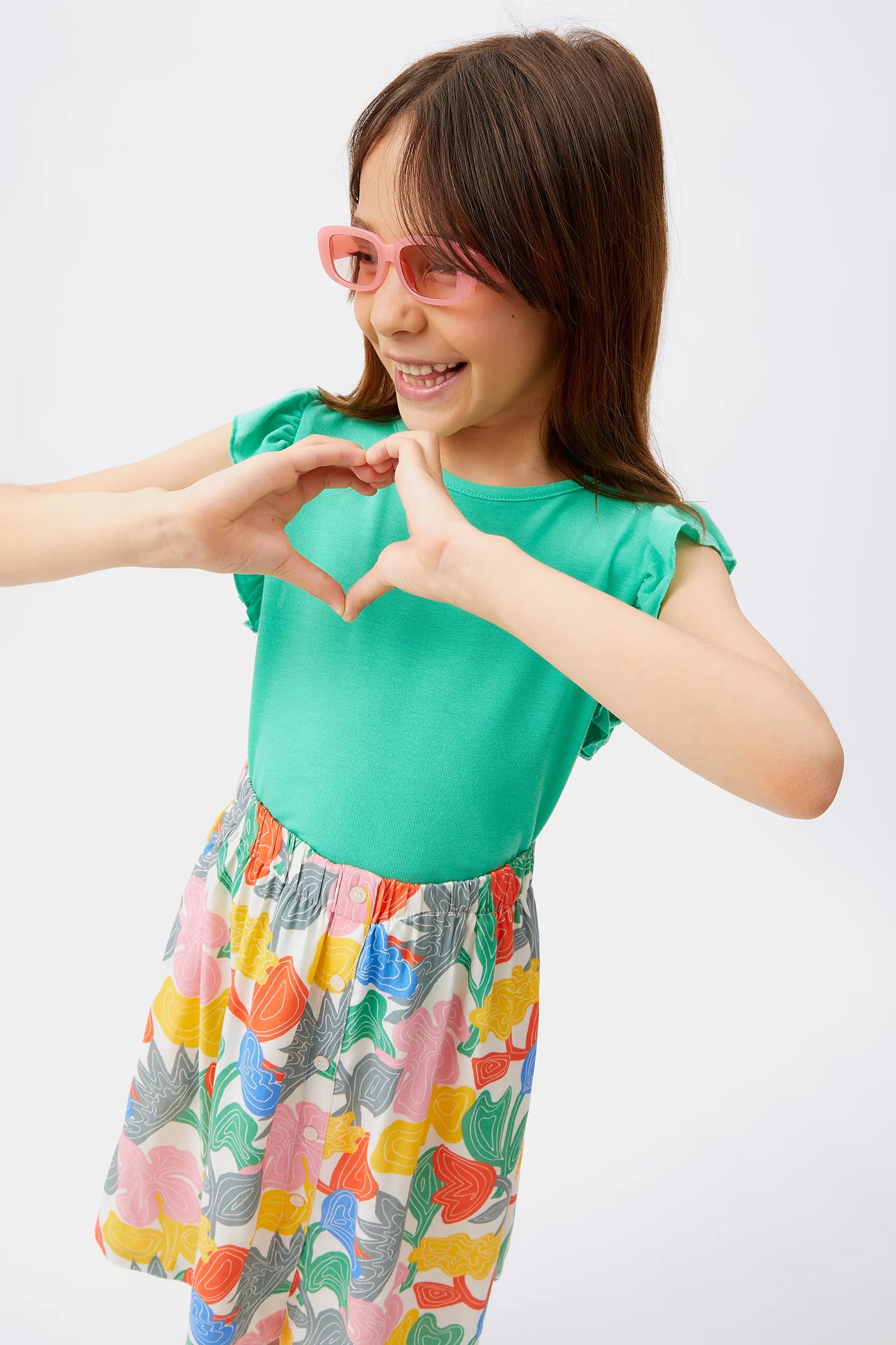 Top de niña con volantes verde