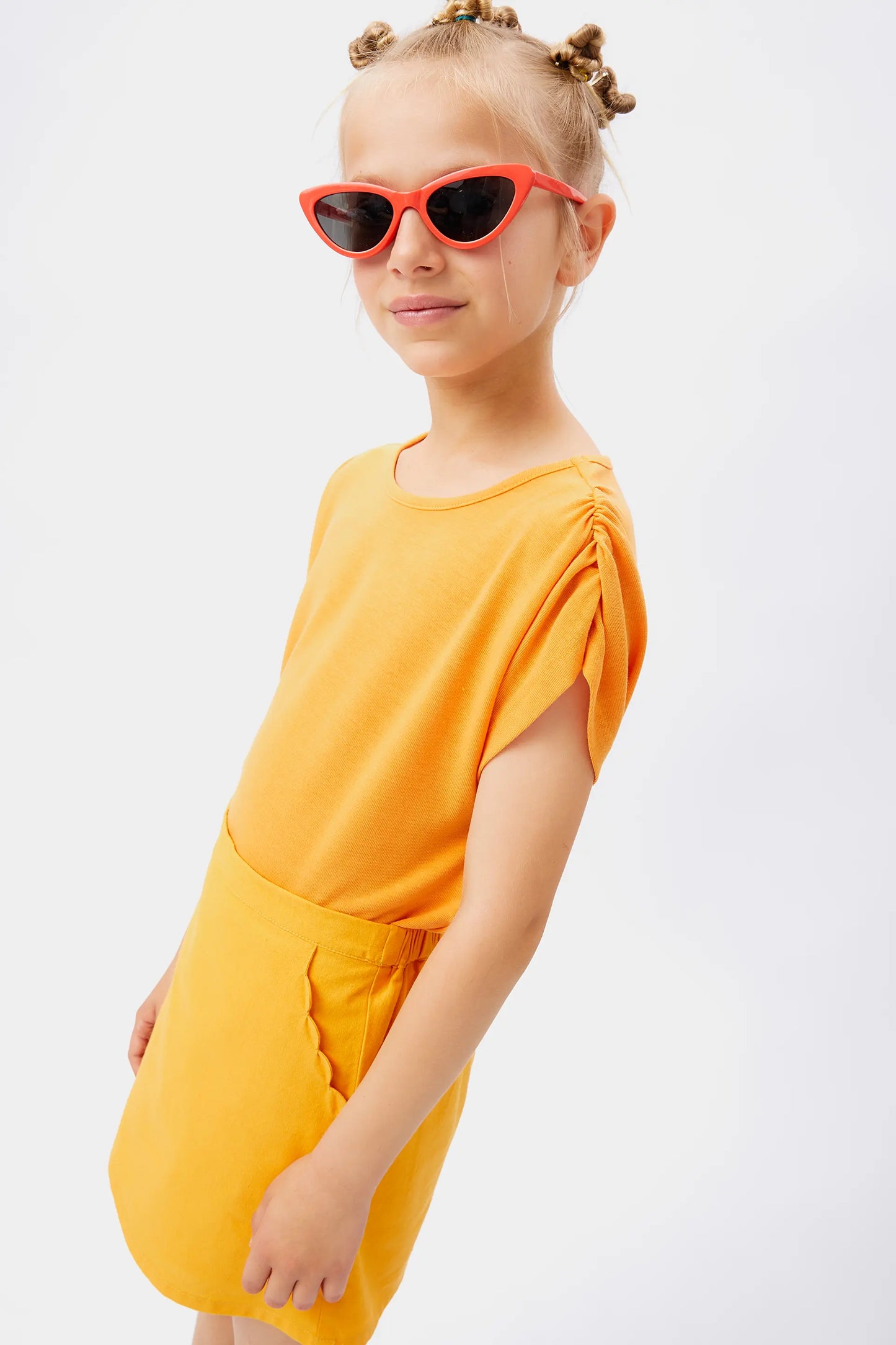 Girl's yellow draped short sleeve top