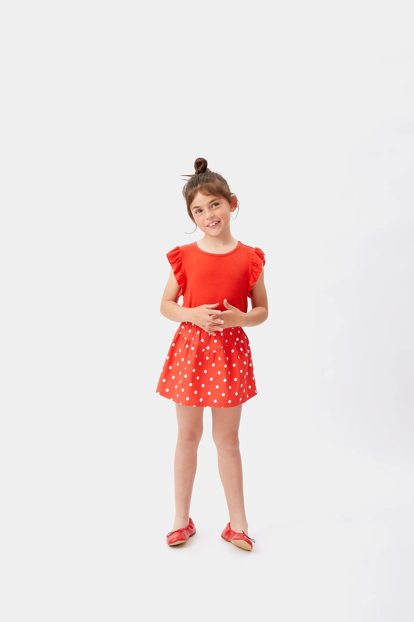 Top da bambina con volant rossi