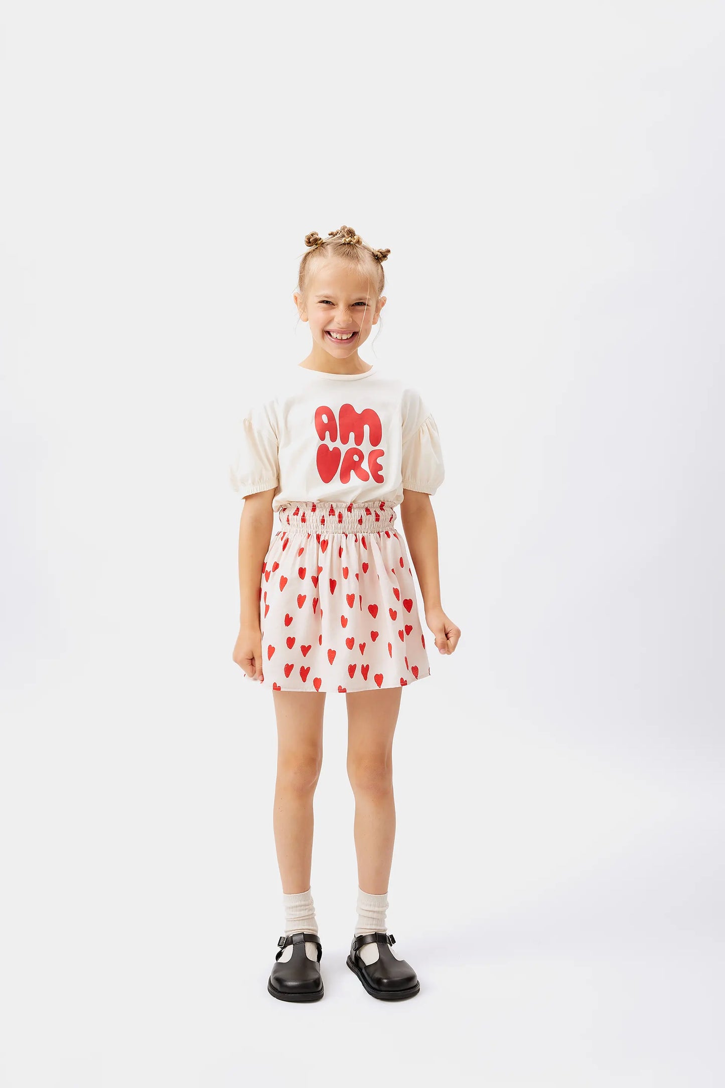 Falda corta de niña estampado corazones