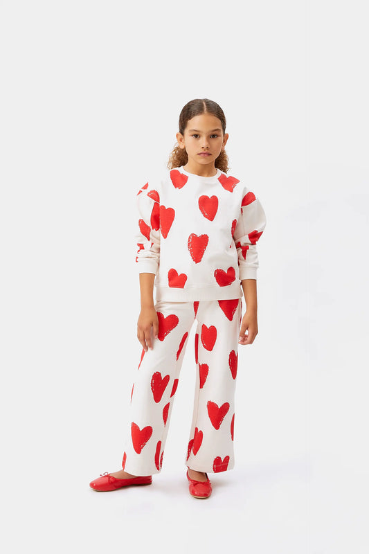 Pantalón unisex estampado corazones