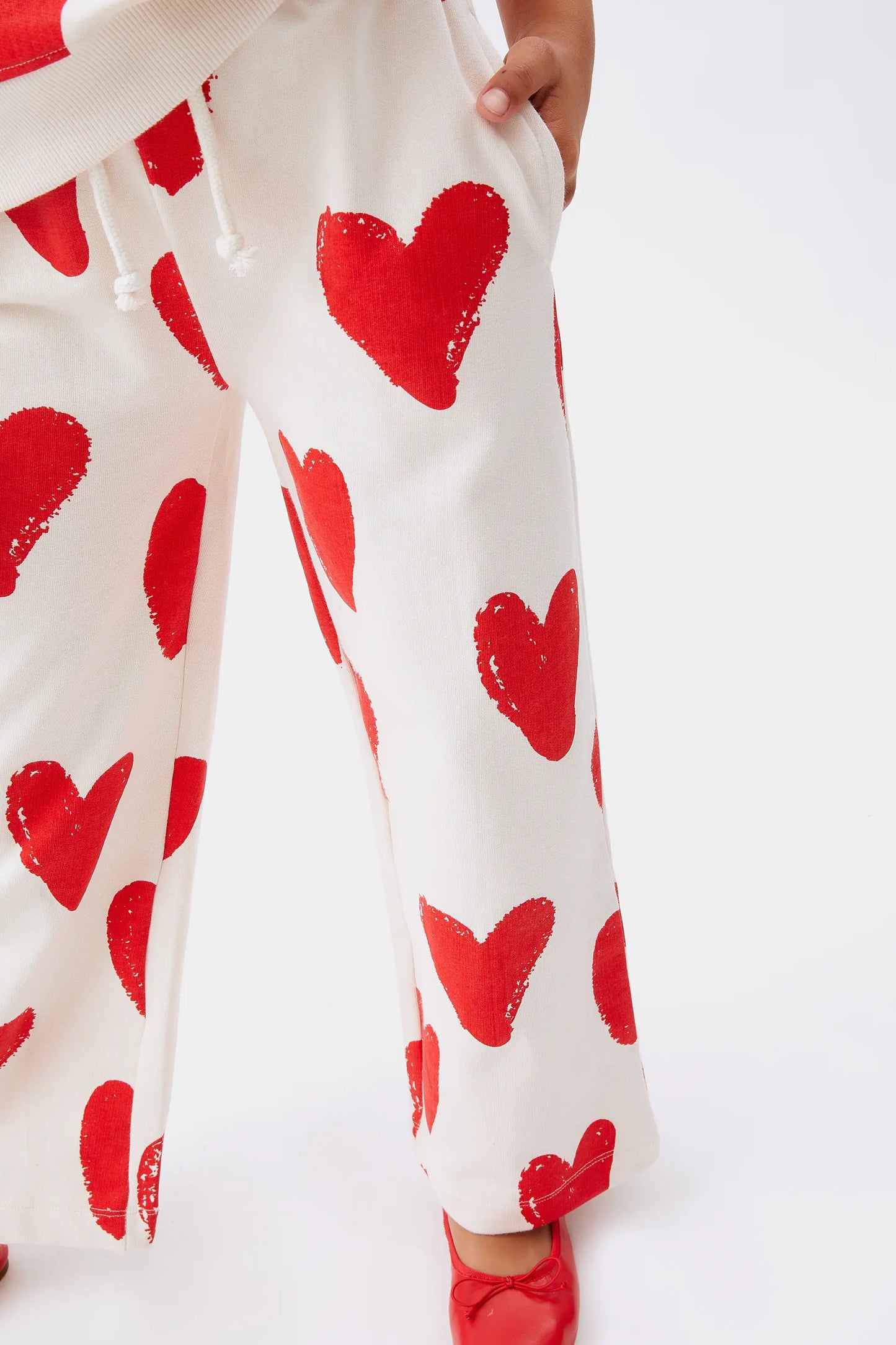 Pantalón unisex estampado corazones
