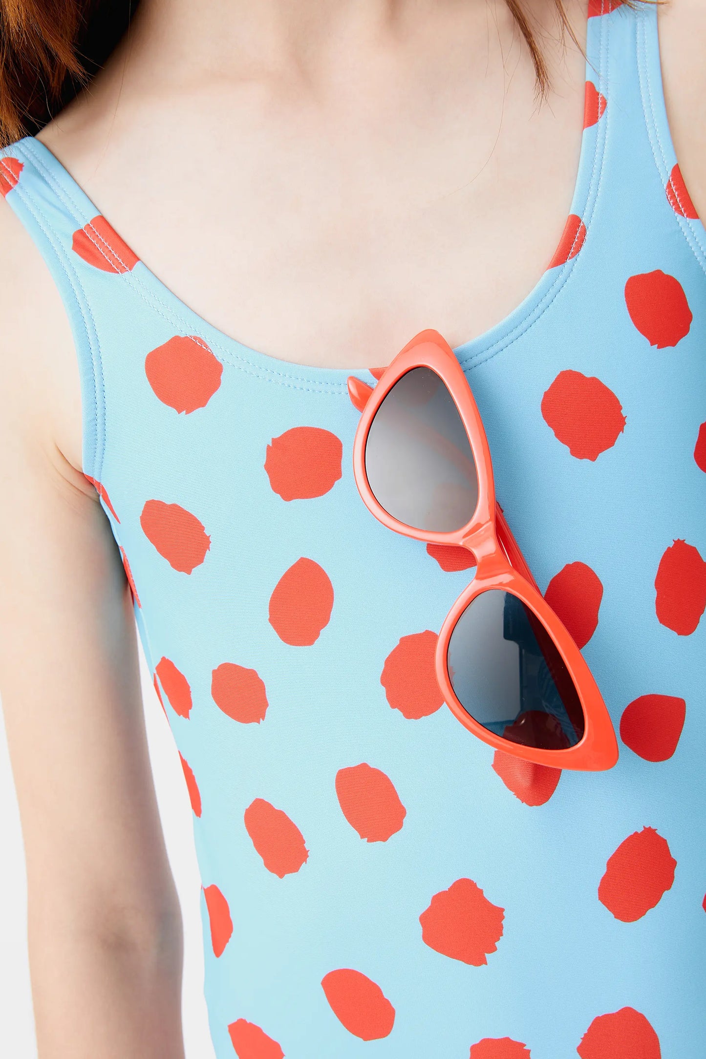 Girl's blue polka dot swimsuit