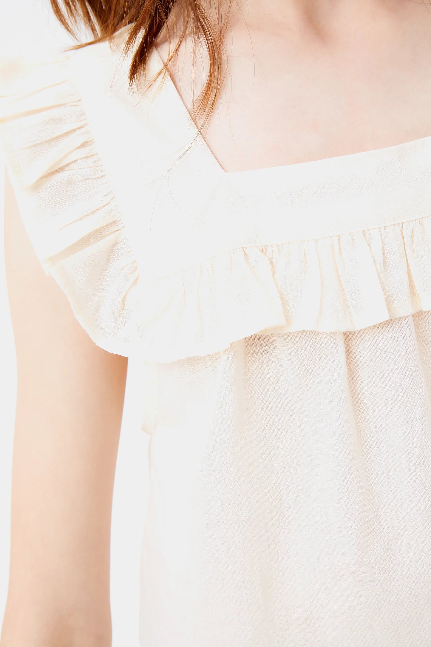 Girl's white ruffle top