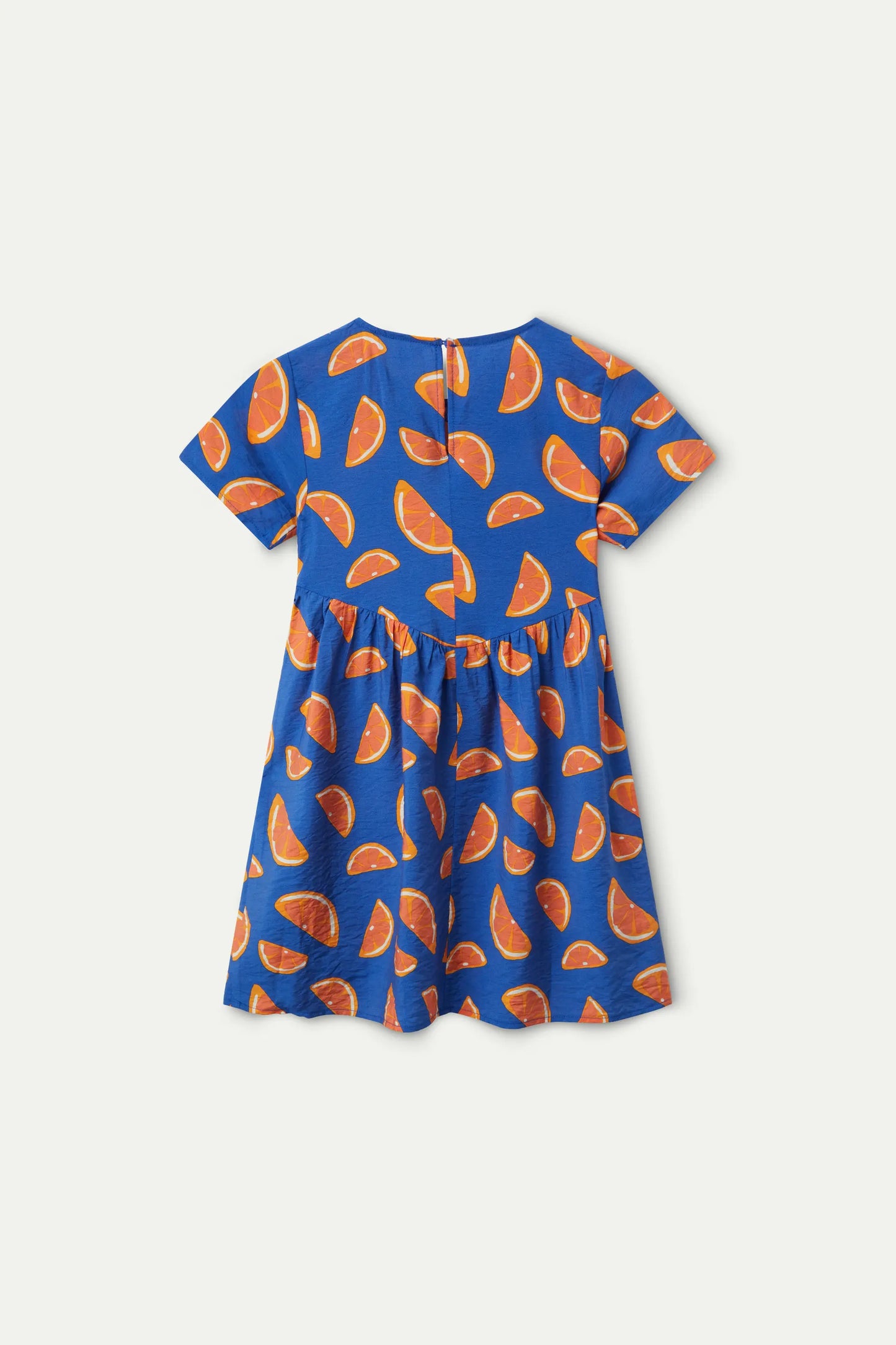 Vestido corto de niña estampado pomelos