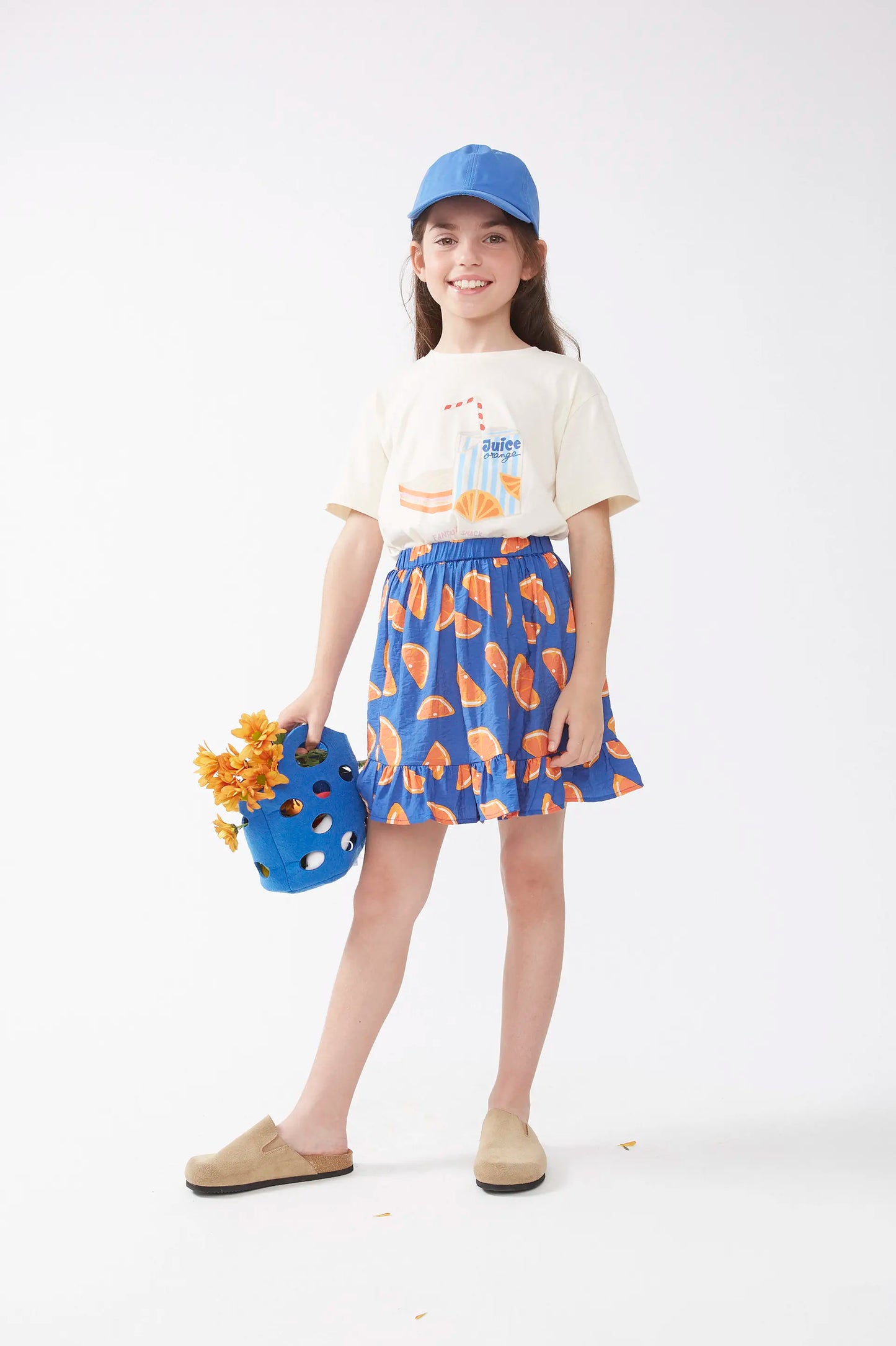 Falda corta de niña estampado pomelos