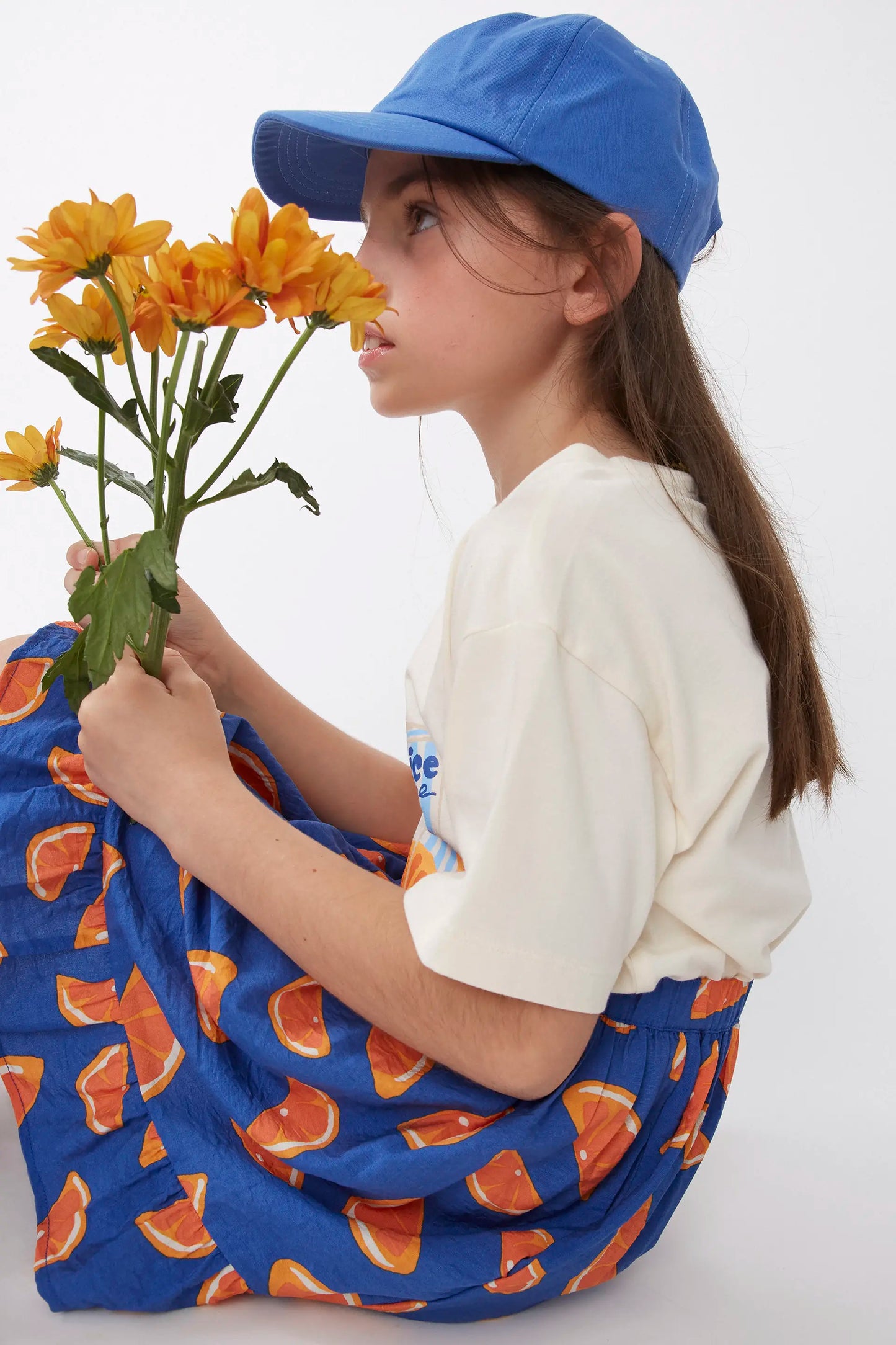 Falda corta de niña estampado pomelos