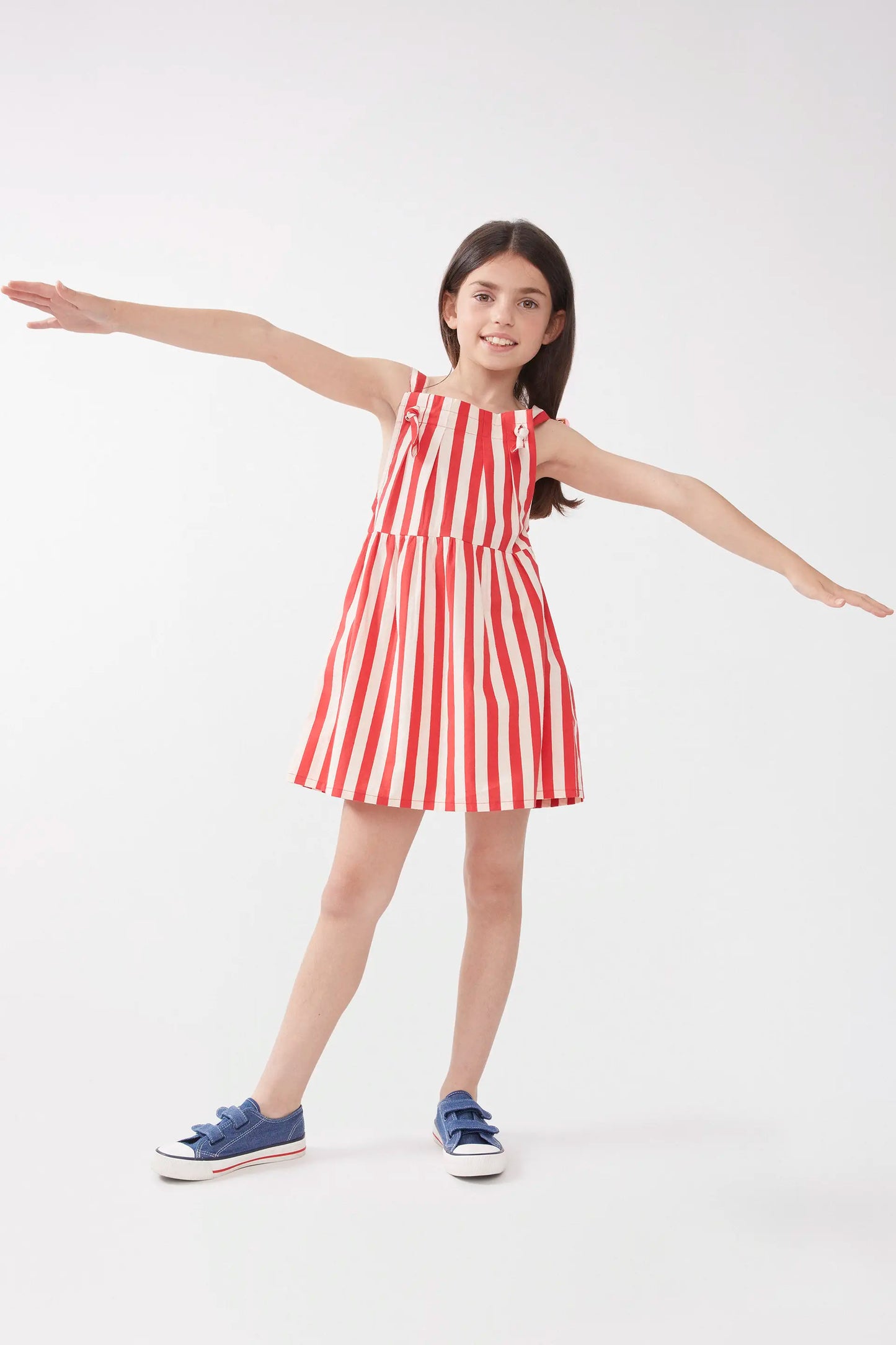 Short girl's dress with red striped straps