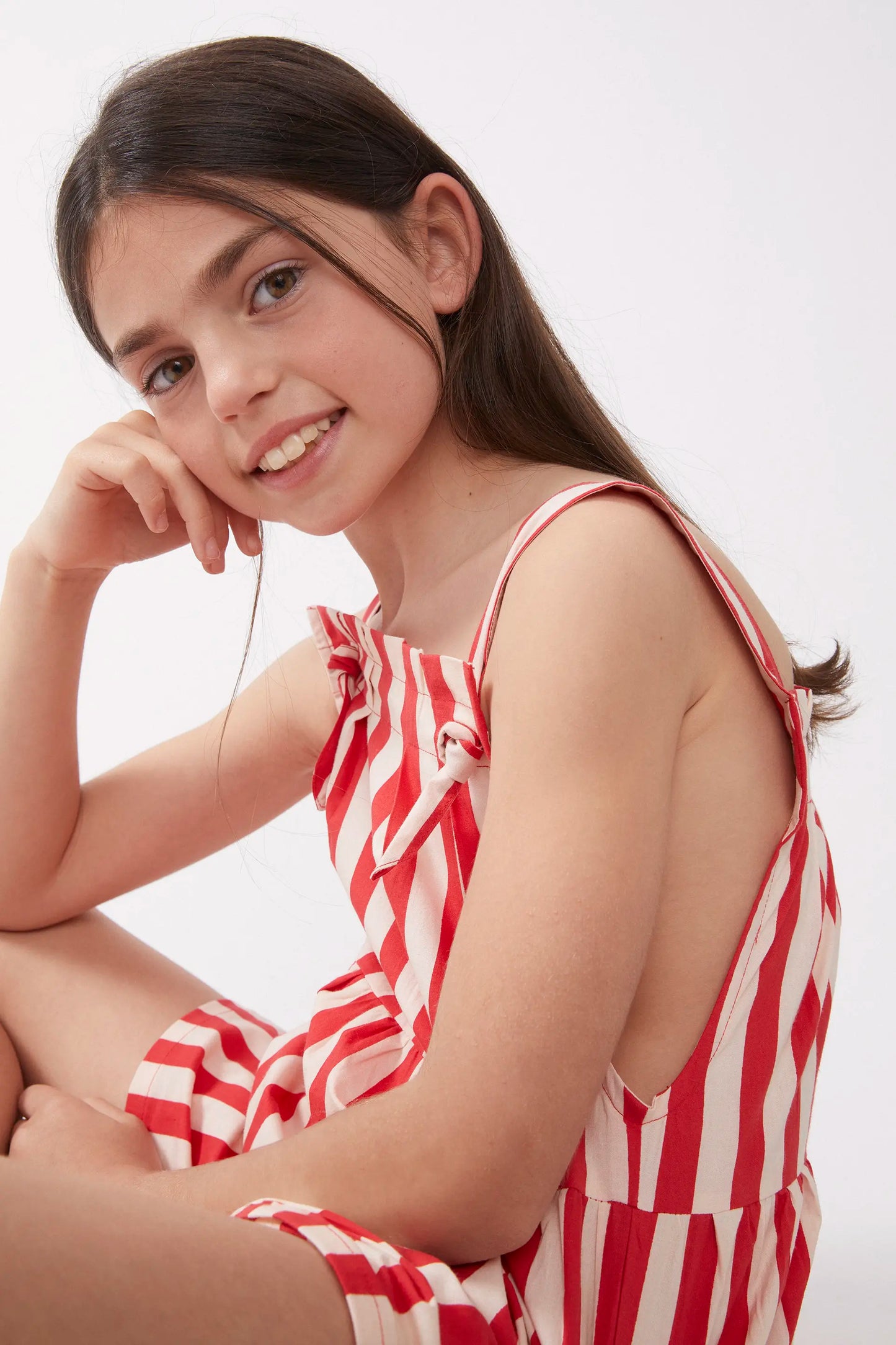Short girl's dress with red striped straps