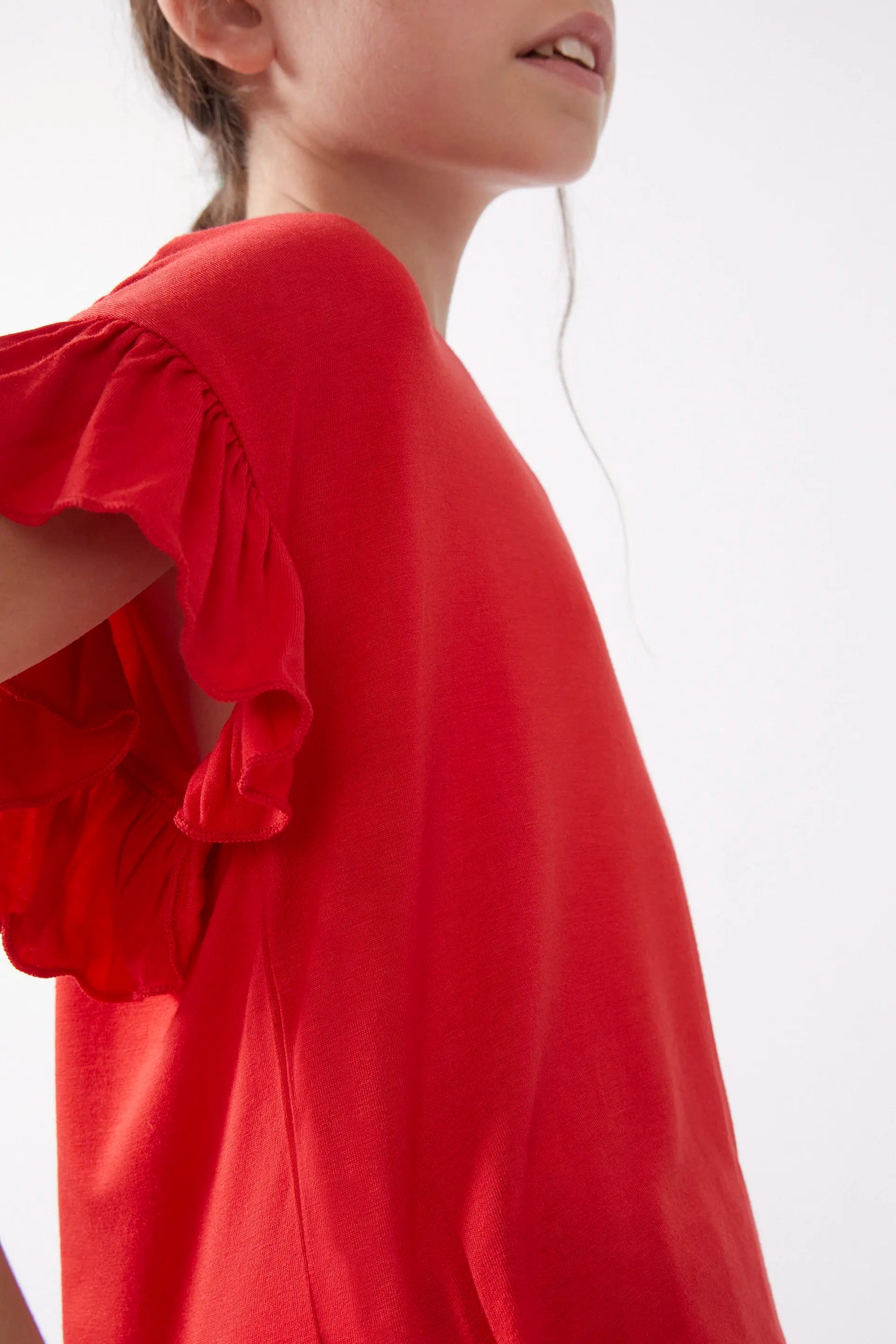 Girl's top with red ruffles