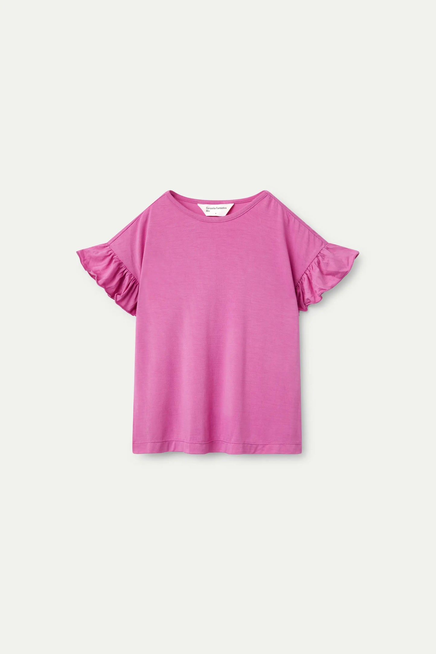 Top rosa con volant per bambina