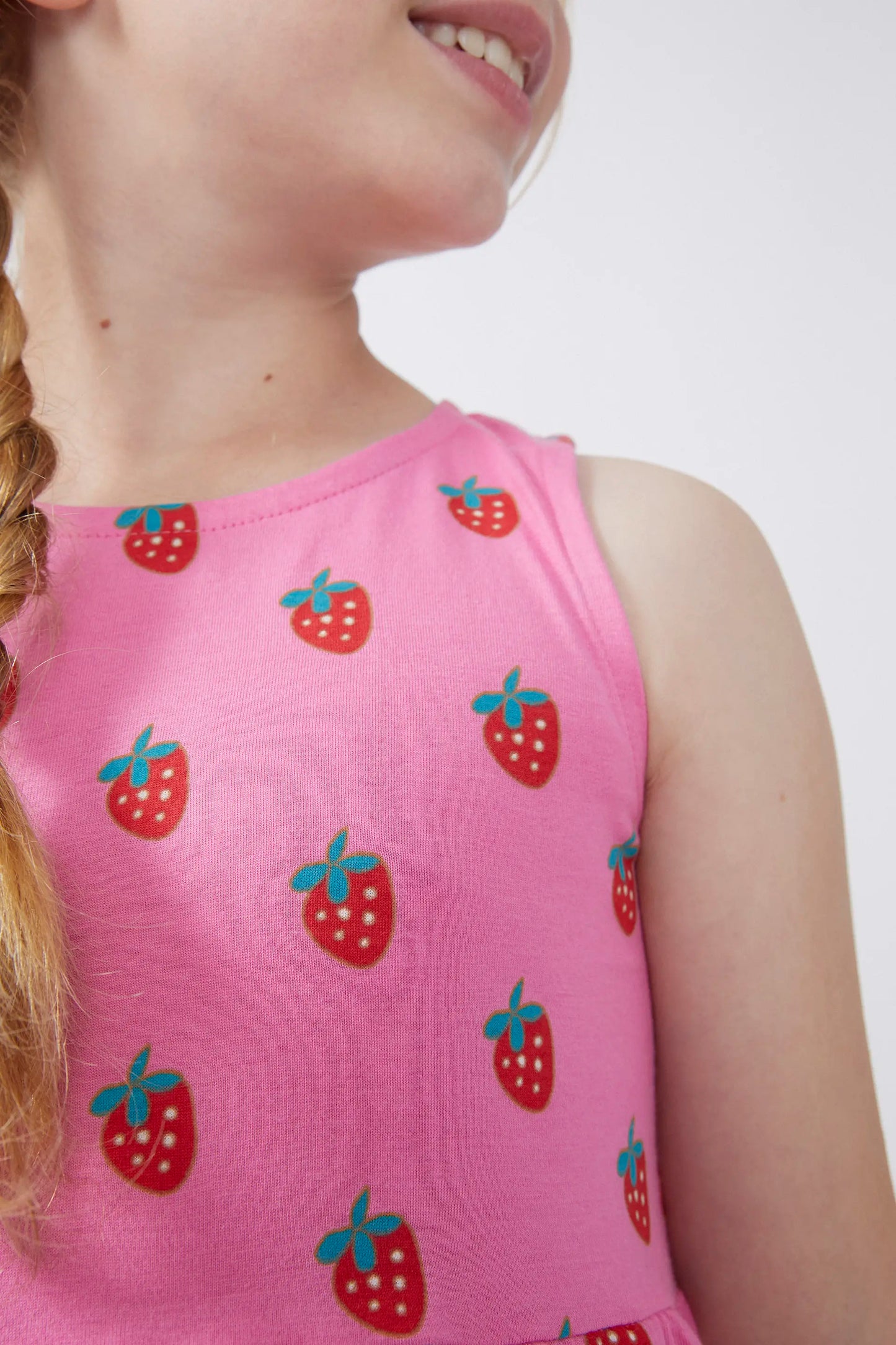 Short sleeveless girl's dress with Sugar print