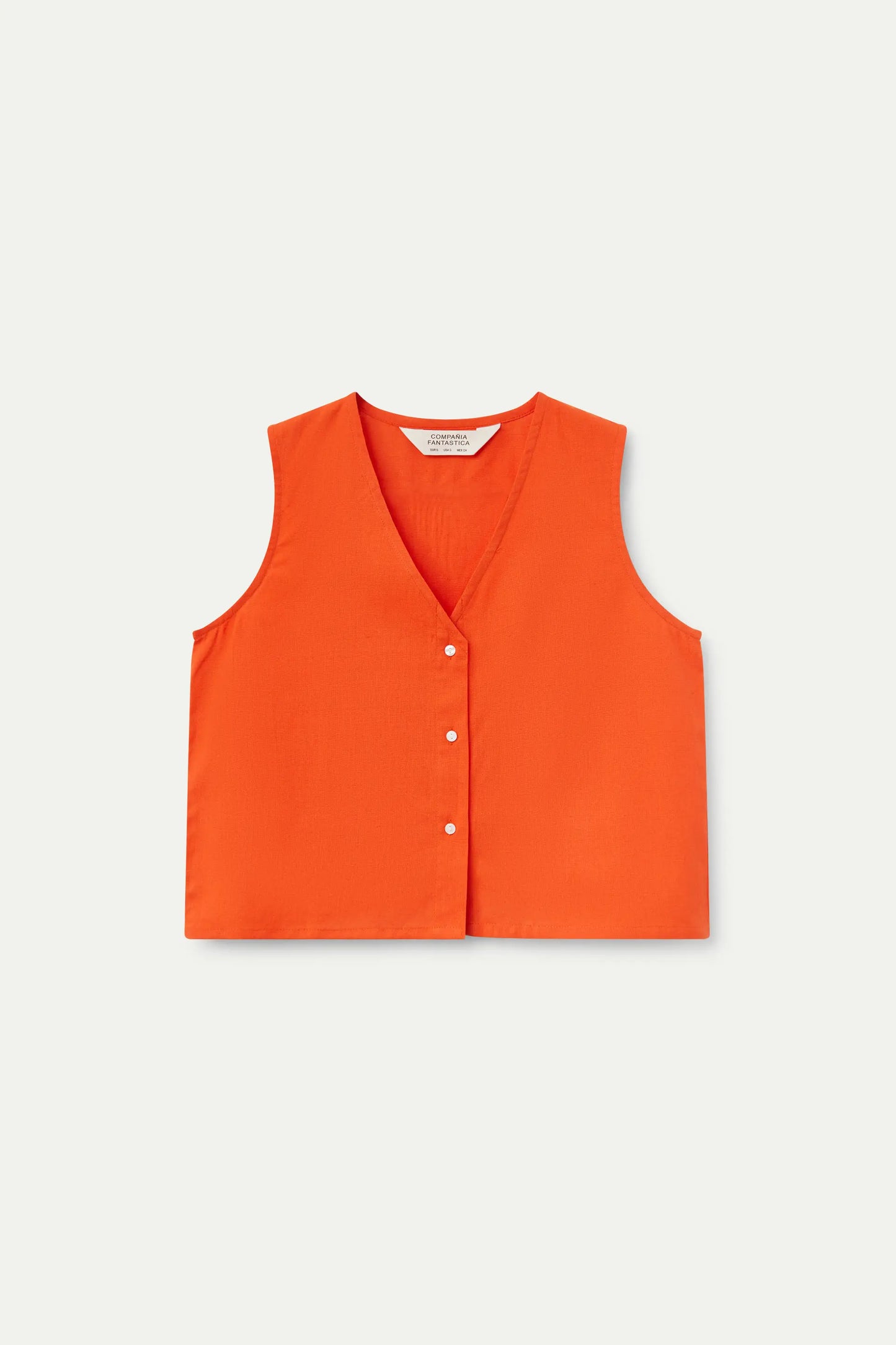 Top arancione con bottoni