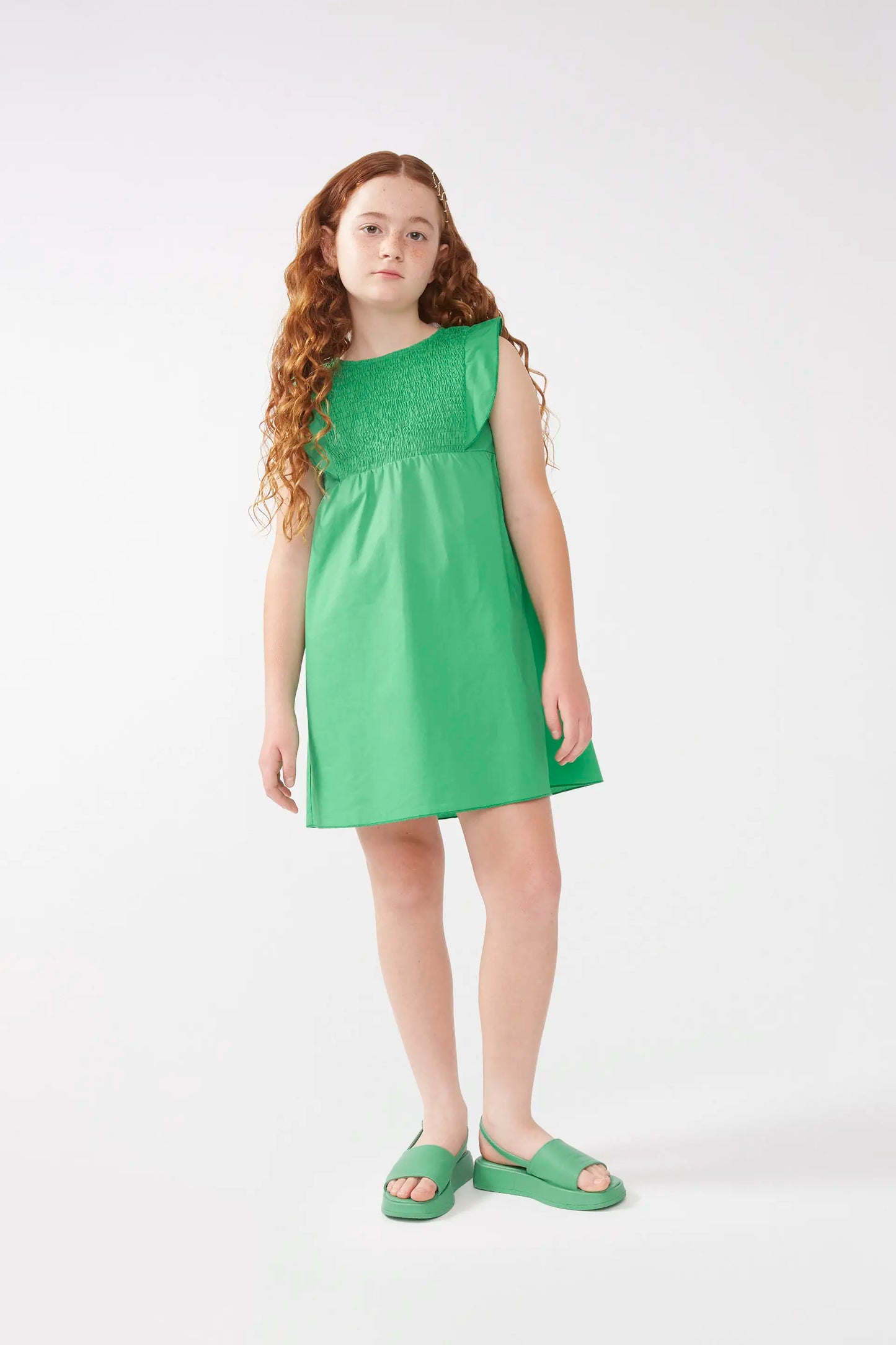 Short green girl's dress