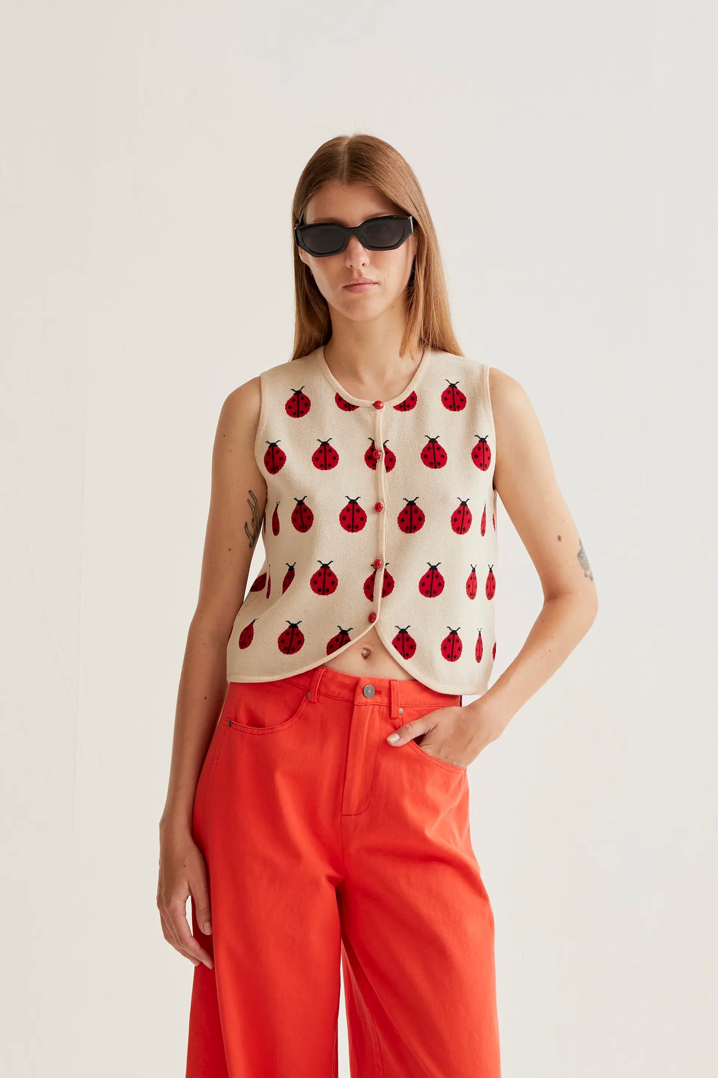 Top in maglia con stampa Coccinella rossa