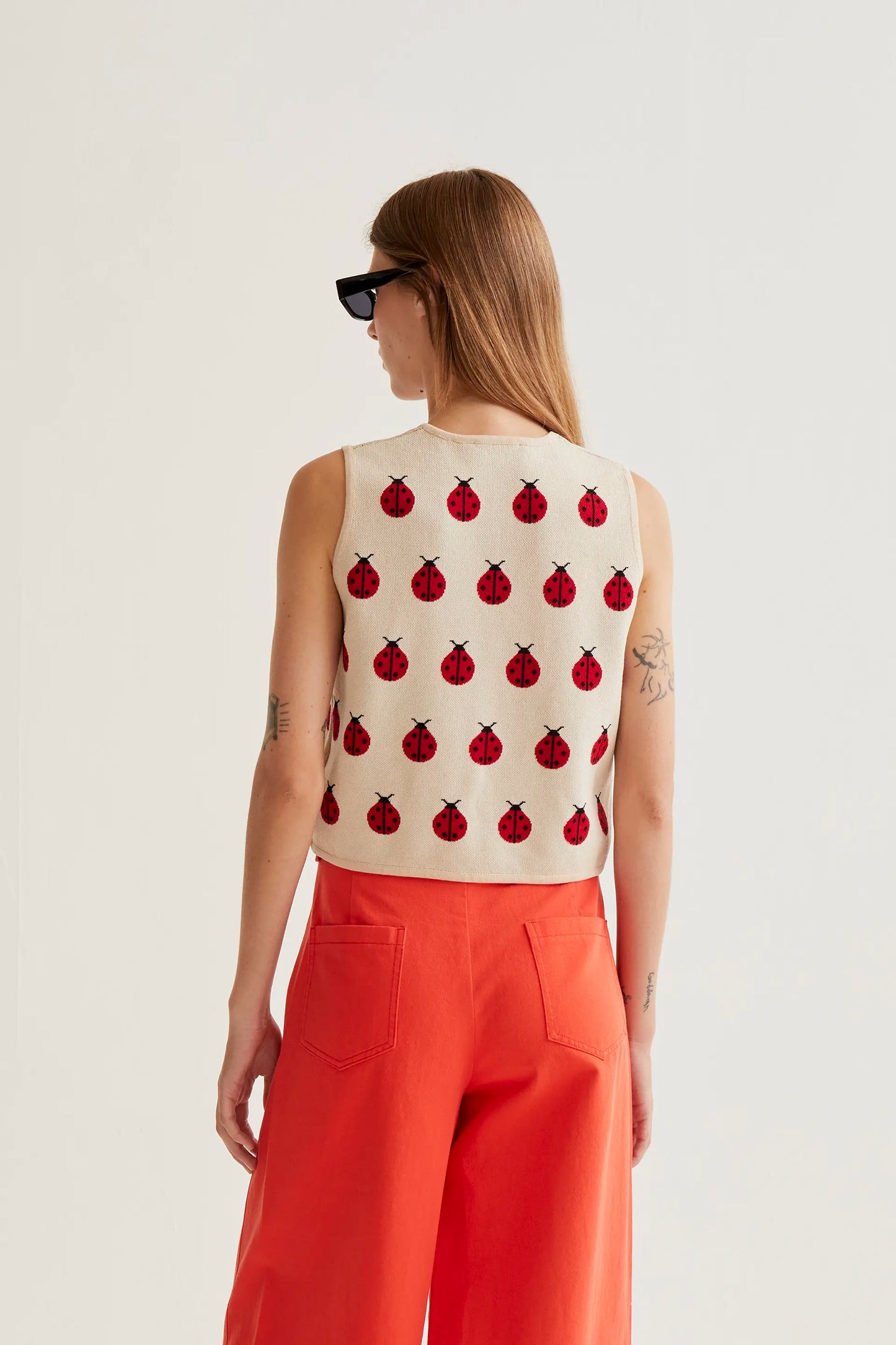 Top in maglia con stampa Coccinella rossa