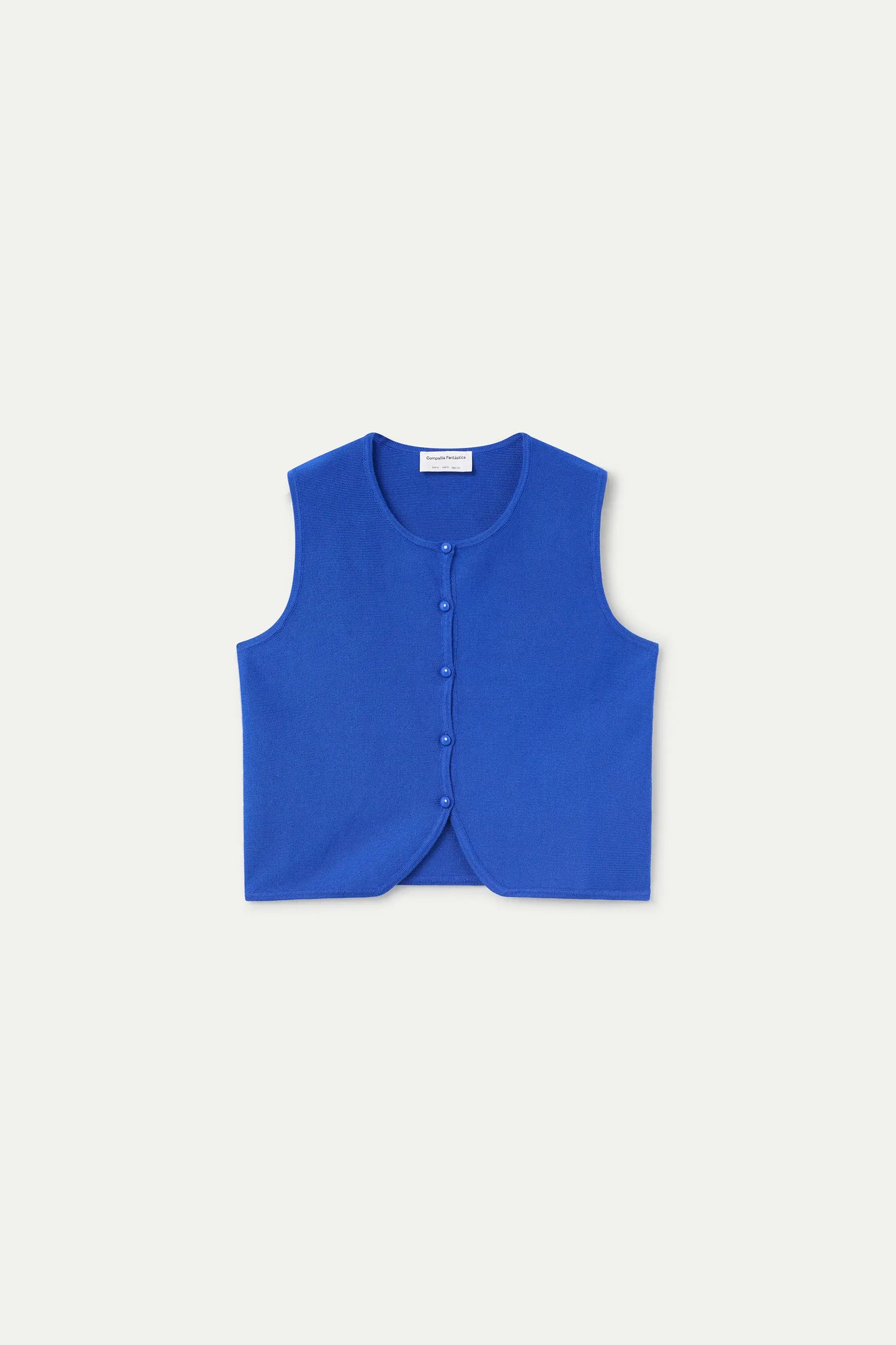 Top in maglia blu con bottoni rotondi