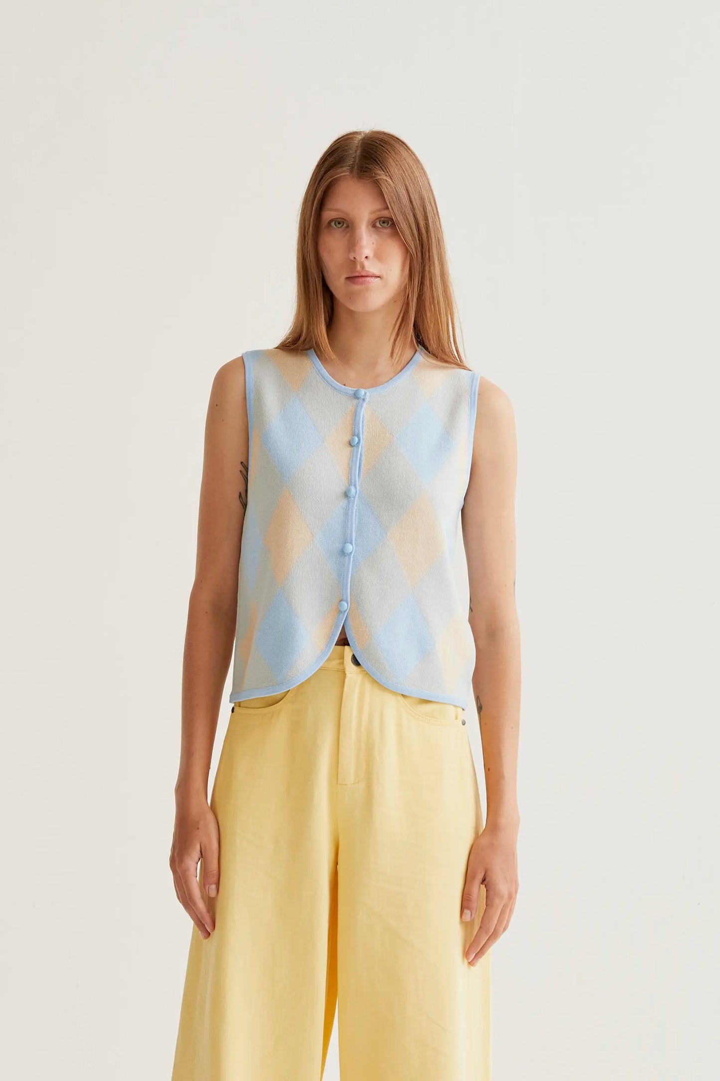Blue diamond-patterned knit top