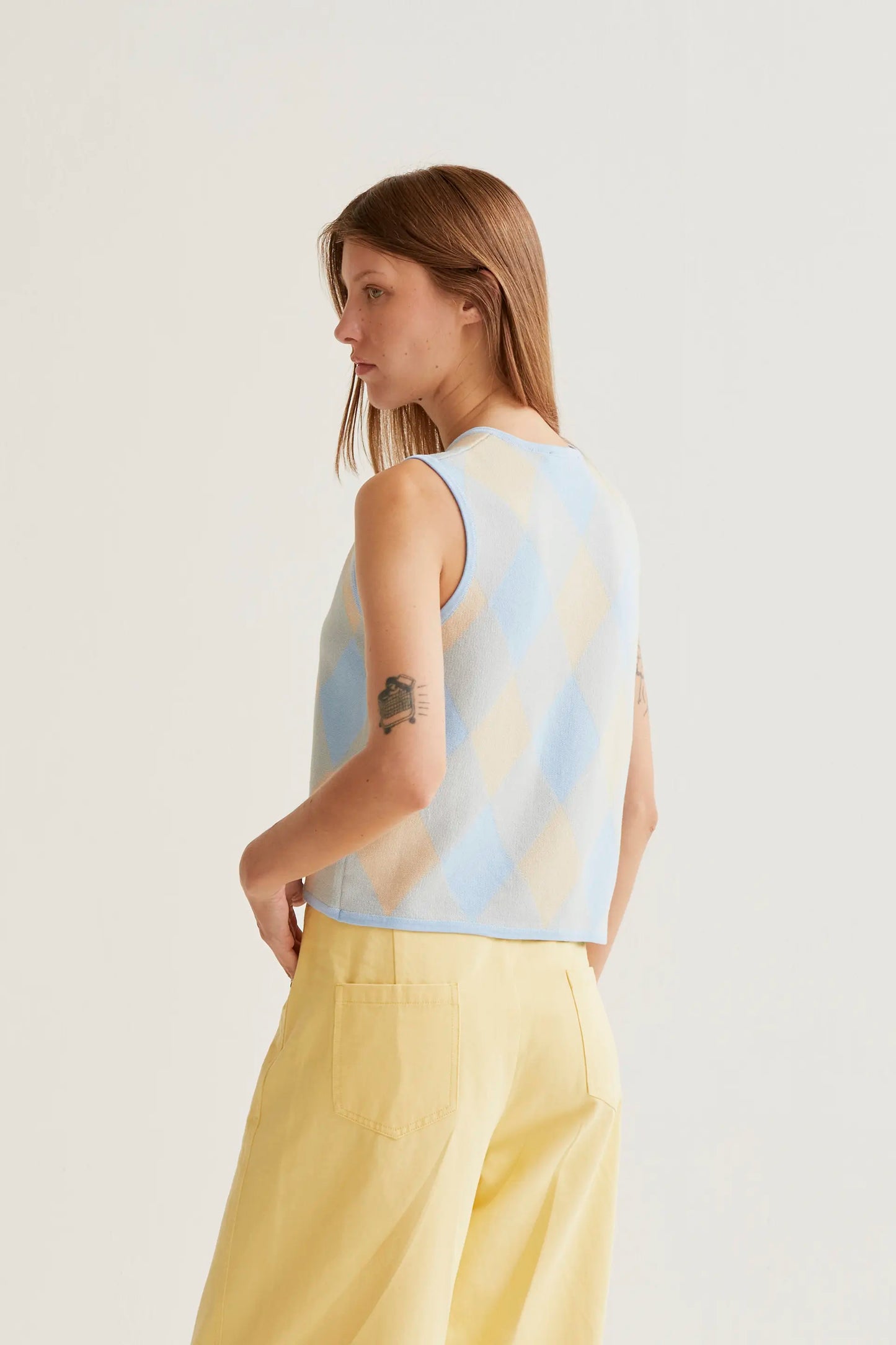 Blue diamond-patterned knit top