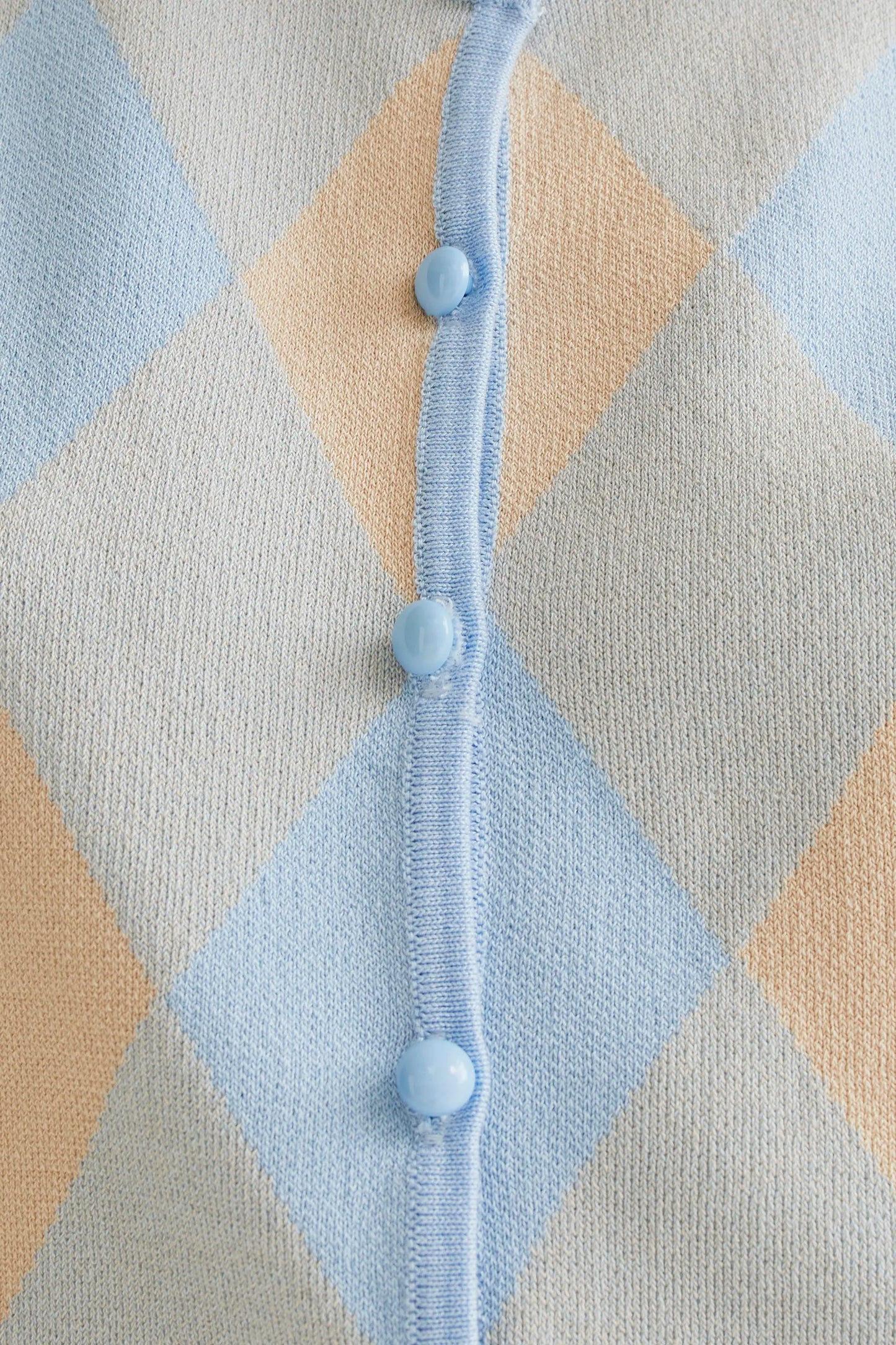 Blue diamond-patterned knit top