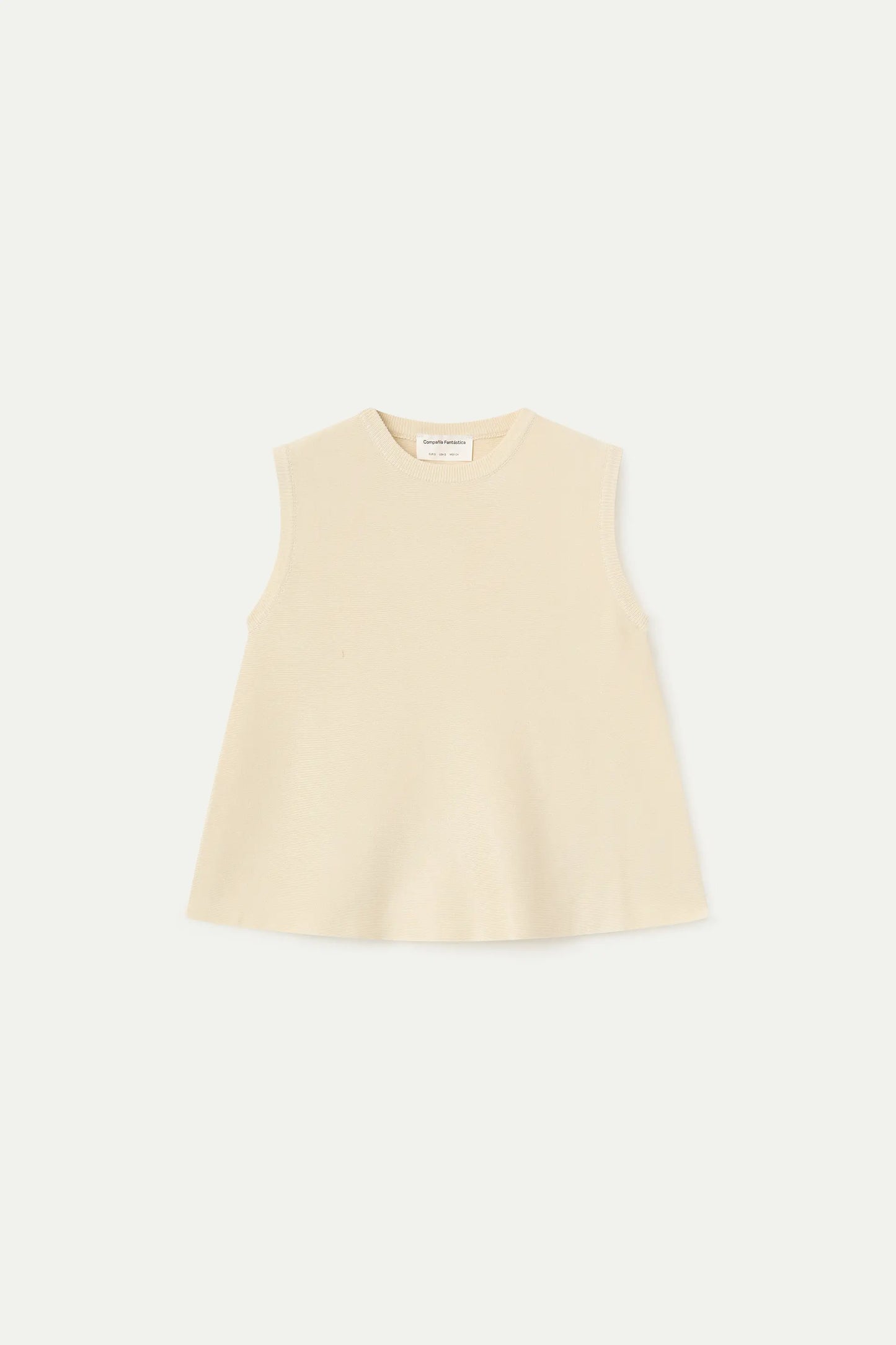 Top básico de punto beige
