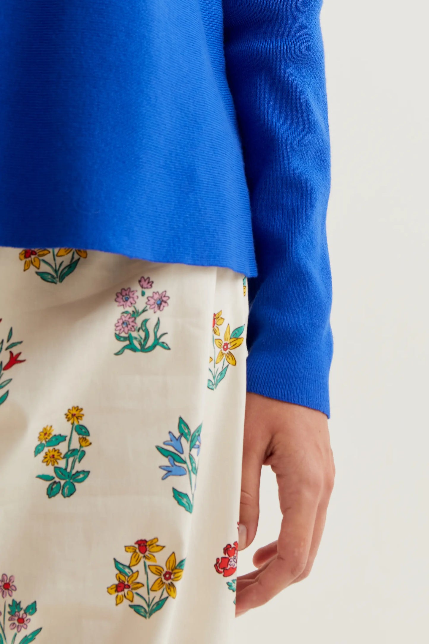 long-sleeved blue knit sweater