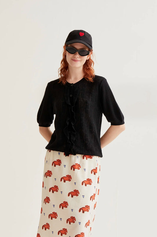 Cárdigan punto floral negro con volantes